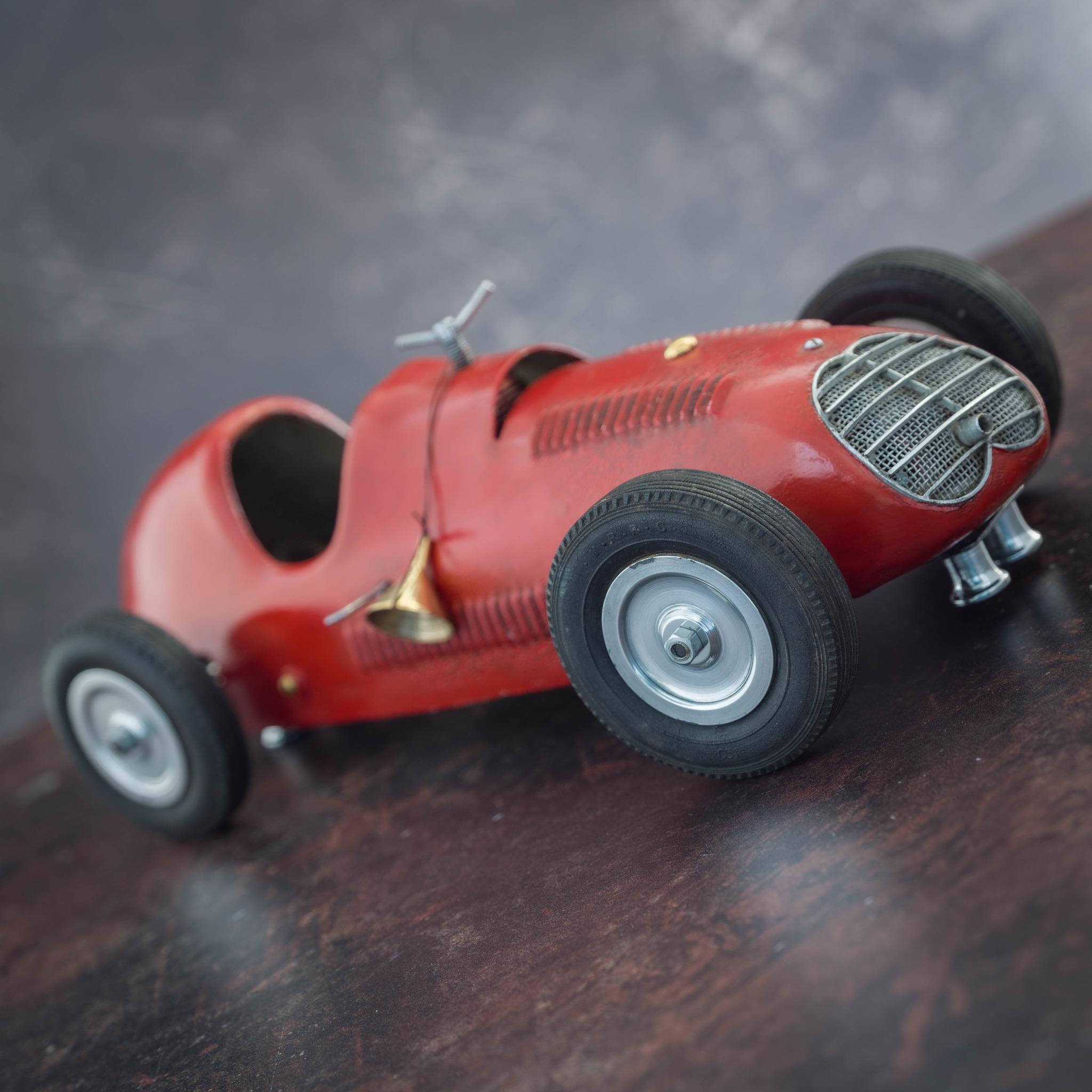 Mid-20th Century Red Metal Body Track Rail Race Car, Circa 1952 For Sale
