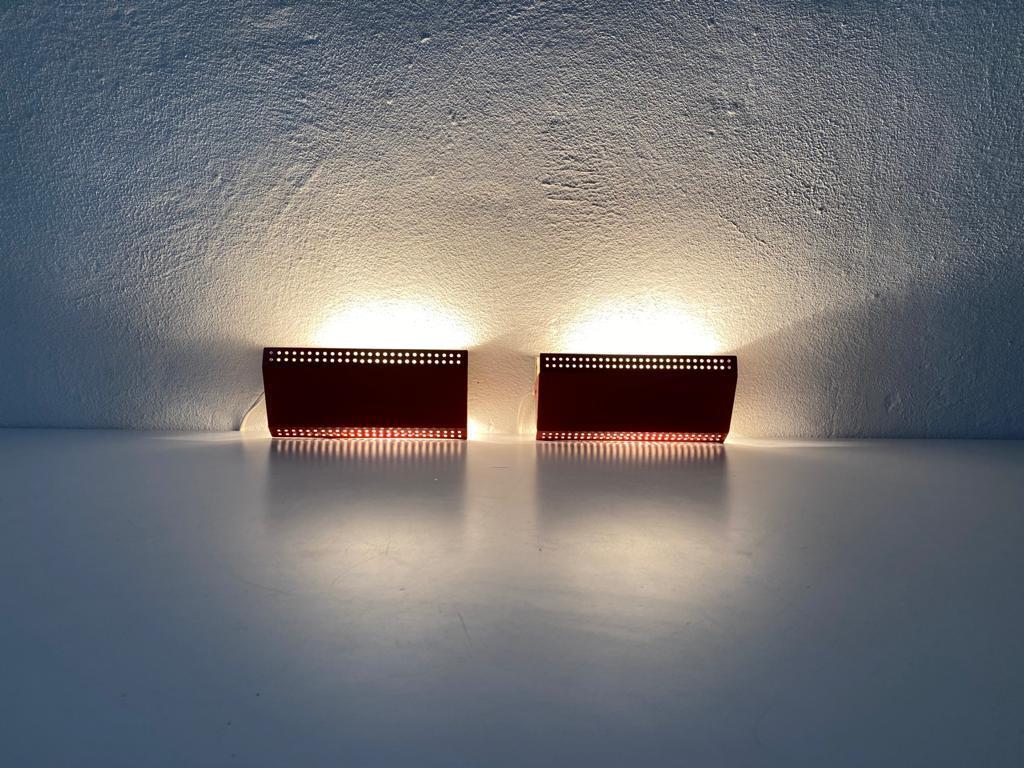 Exceptional Danish red and white metal pair of sconces by SCANOTEC,
Adjustable Reflectors
Stilnovo Era, 
1950s Denmark

Very elegant and Minimalist wall lamps.
There are two switch on-off ropes 


Lamps are in very good condition.

These