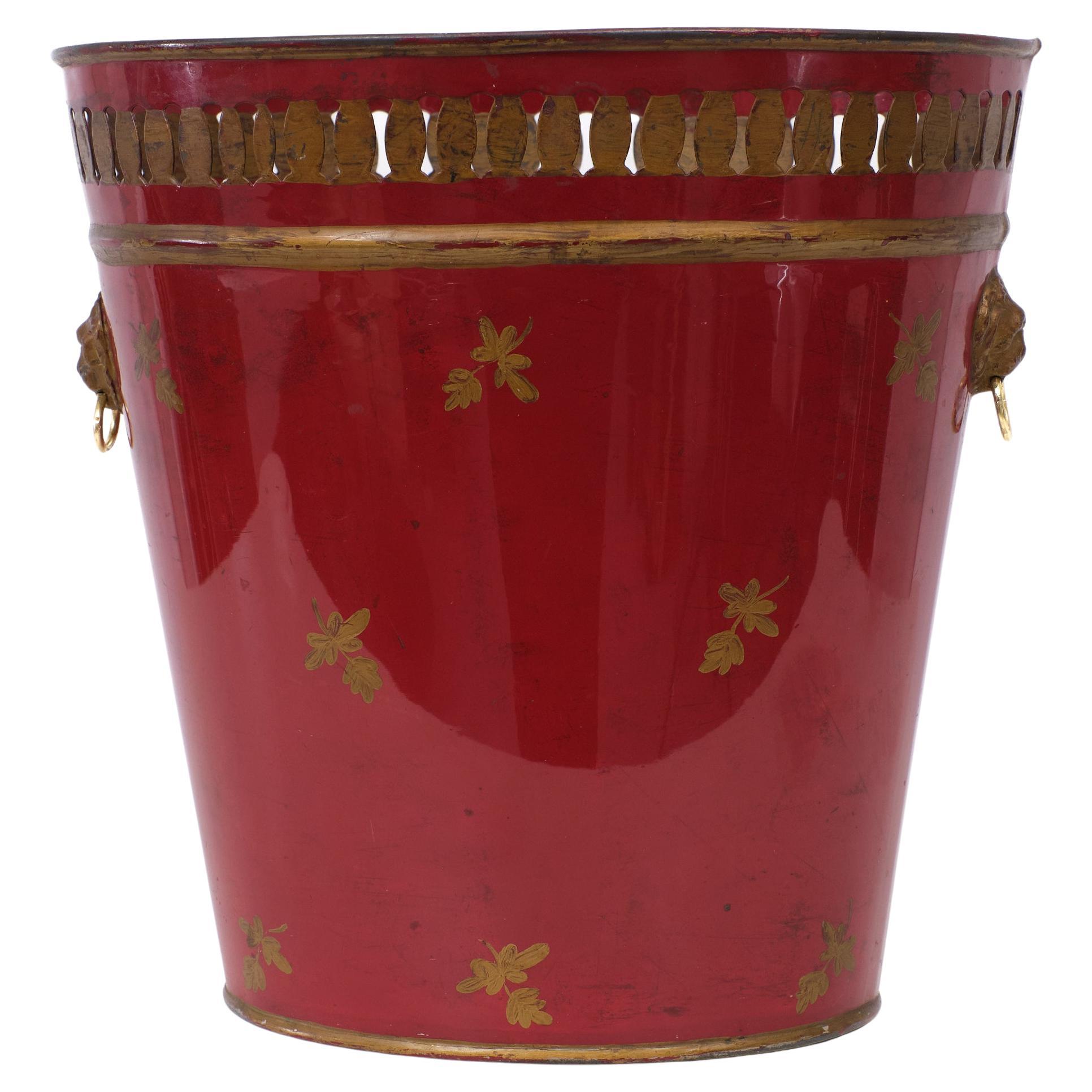 Very nice small Metal waste basket . Beautiful Red color ,comes with hand painted 
Gold color lining and decorations .Two Bronze Lions heads with brass rings .
Perforated rim on top .  so classy 