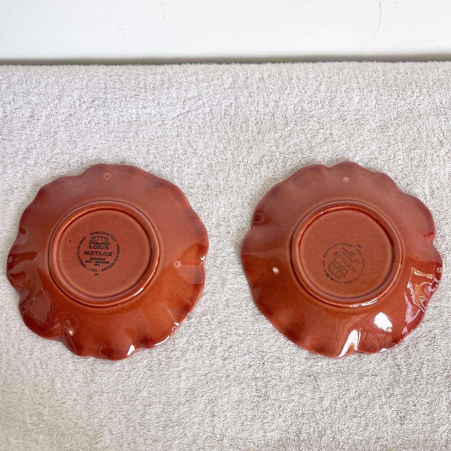 Add a pop of color to your table with this exceptional pair of vintage red Metlox Poppytrail Lotus plates. Perfect for showcasing your culinary creations.

Exceptional pair of vintage red Metlox Poppytrail Lotus plates
Add a pop of color to your