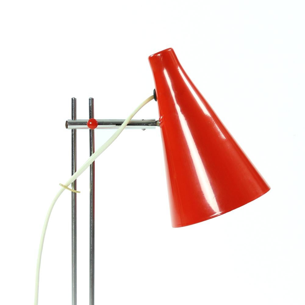 Beautiful table lamp designed by Josef Hurka for Lidokov in Czechoslovakia. Classical midcentury design with simple lines and beautiful details. Lacquered metal in red color. The chrome construction in excellent condition. The lamp is in very good