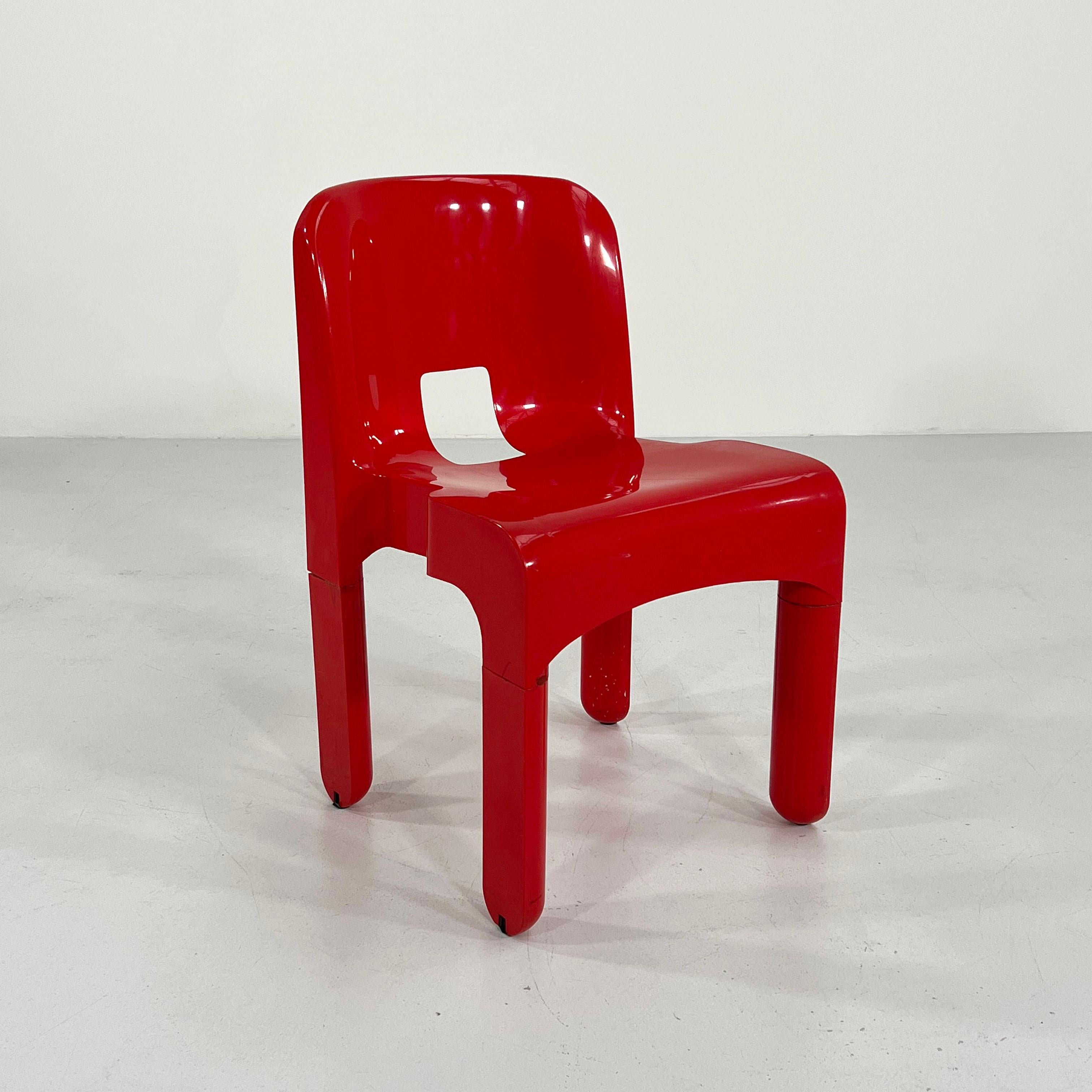 Designer - Joe Colombo
Producer - Kartell
Model - Universale Chair / Model 4869
Design Period - Seventies
Measurements - Width 44 cm x Depth 44 cm x Height 72 cm x Seat Height 45 cm
Materials - Plastic
Color - Red
Condition - Good 
Comments