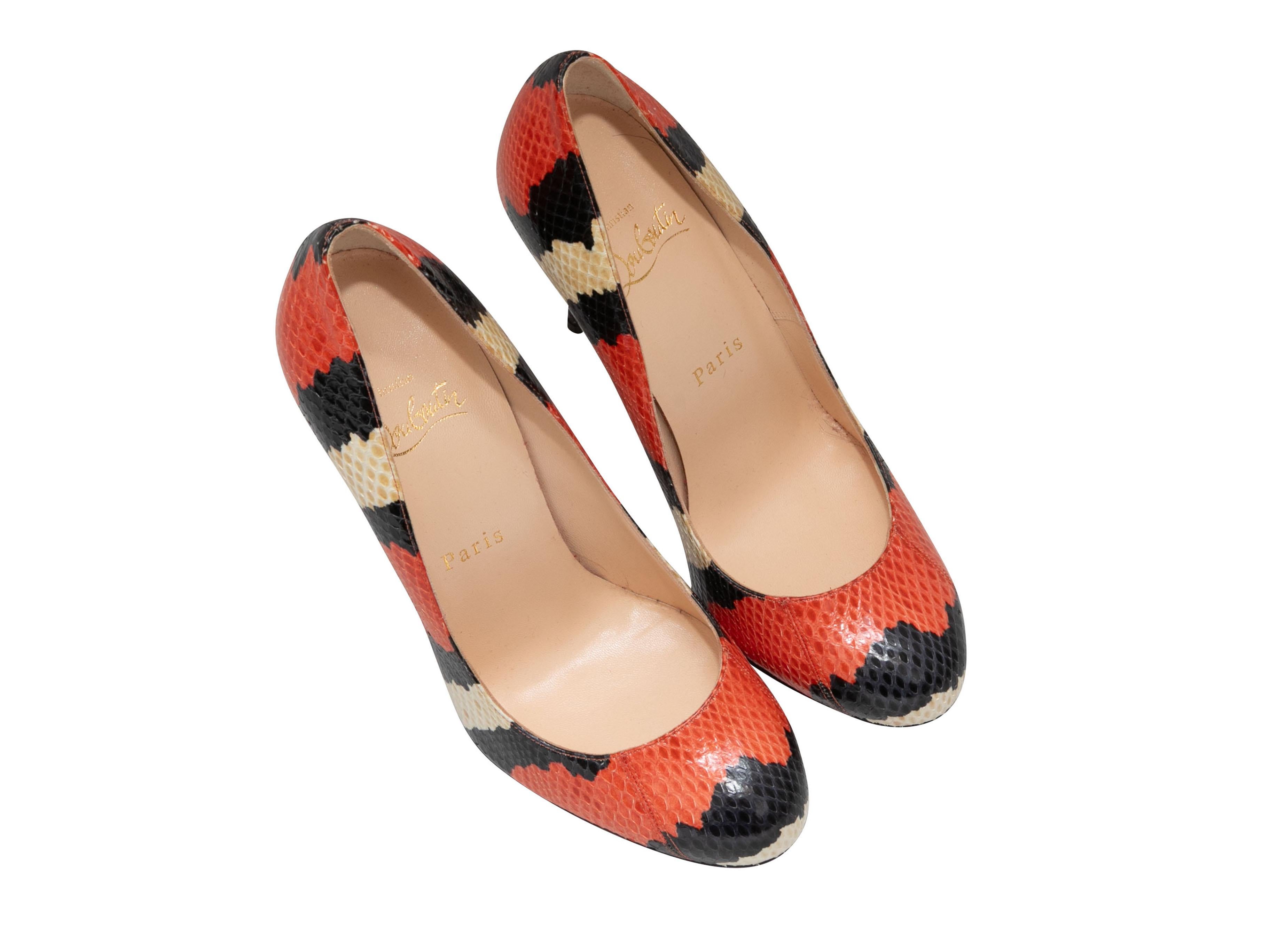 Red, cream, and black tricolor python pumps by Christian Louboutin. 4