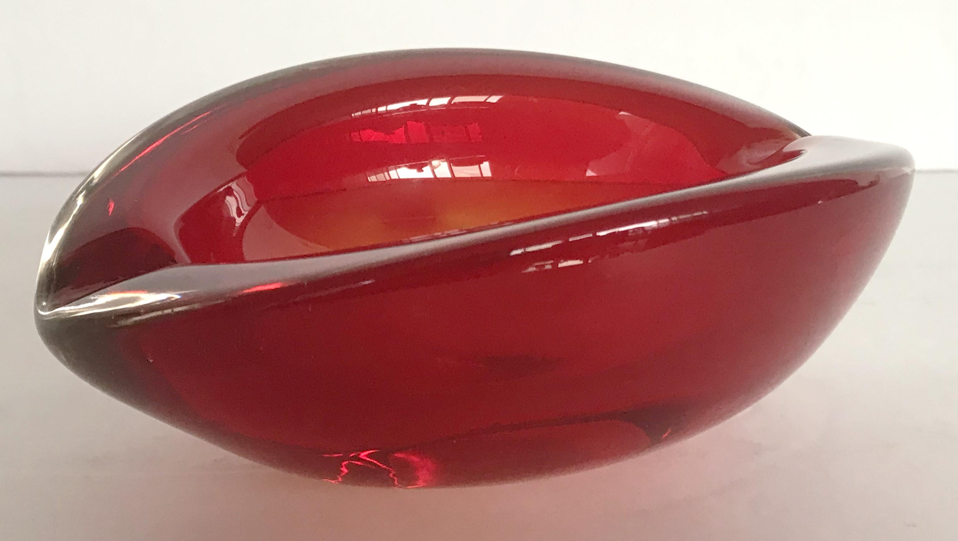 Vintage red Murano glass ashtray or candy bowl / Made in Italy, circa 1960s 
Measures: width 6.5 inches, depth 5 inches, height 2.5 inches 
1 in stock in Palm Springs ON 50% OFF SALE for $449 !!
Order Reference #: FABIOLTD G194
This piece makes for