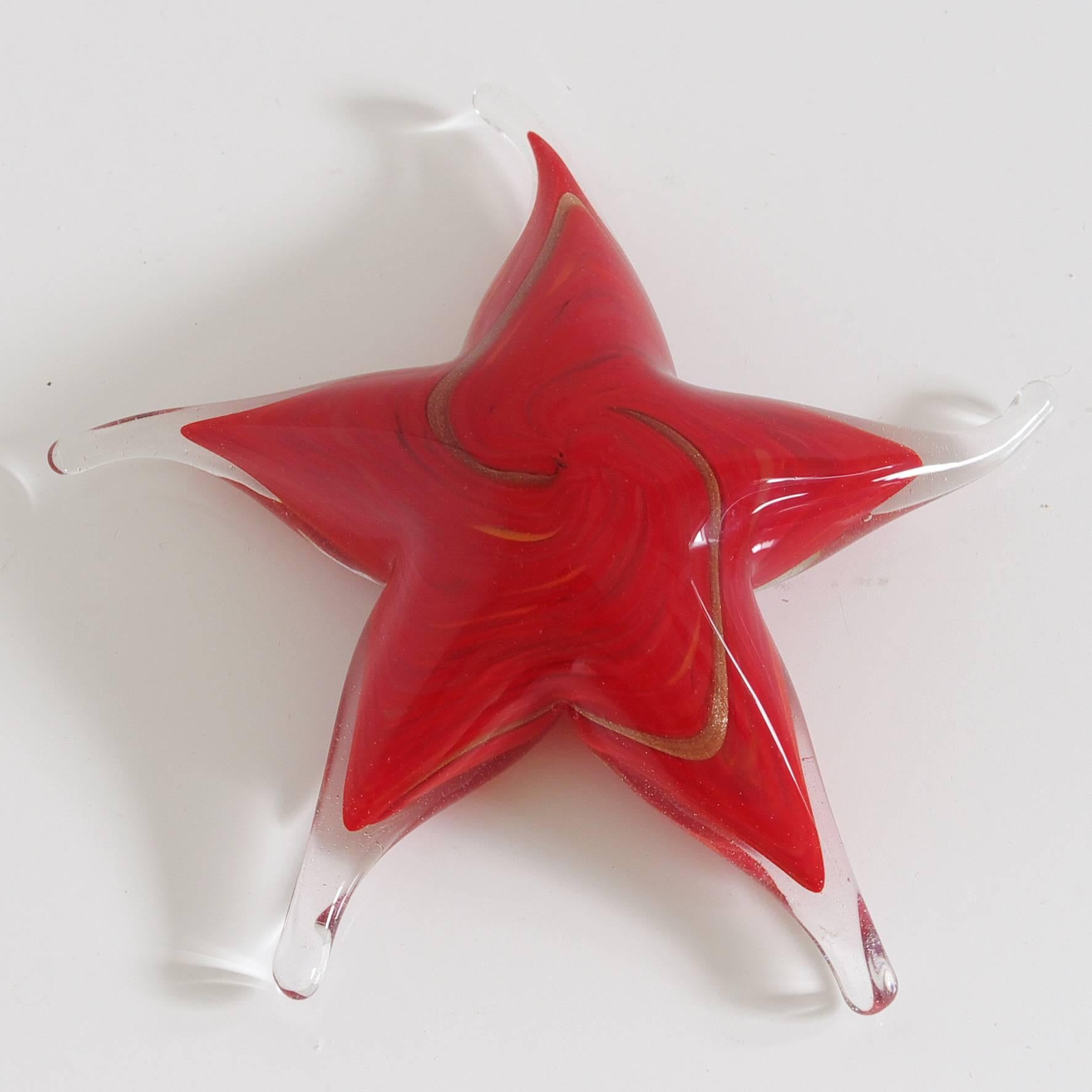 Vintage Italian red and gold infused Murano glass star paperweight / Made in Italy in the 1980s
Diameter: 5 inches / Height: 1.5 inches
One in stock in Palm Springs currently ON FINAL CLEARANCE SALE for $299!!!
This piece makes for a great and
