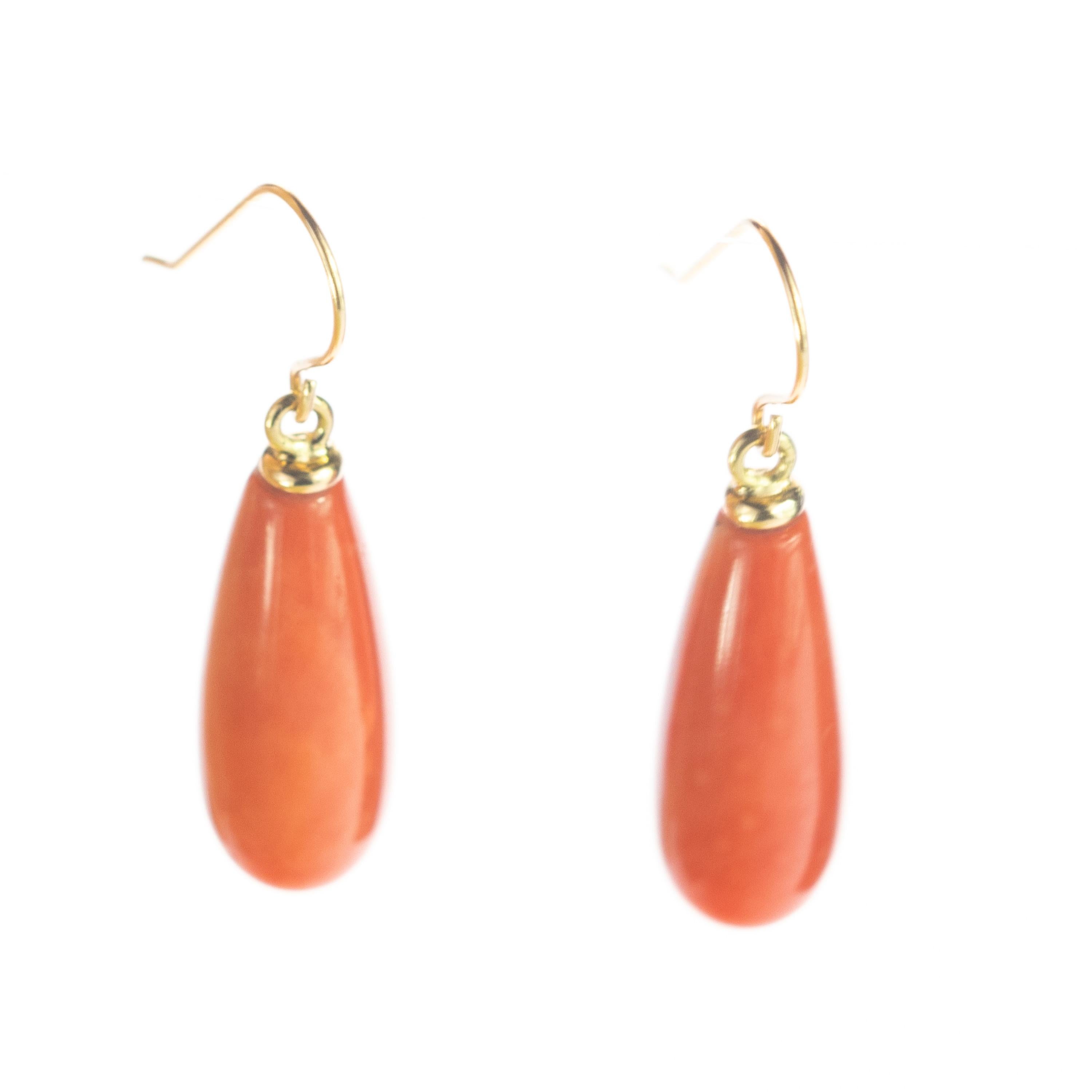 Precious coral drops, hanging from 18 karat yellow gold delicate ear wires. This stunning masterpiece with high quality craftsmanship was born in the Intini Jewels workshop. Our designers add all the Italian modern style and glamour in one exquisite