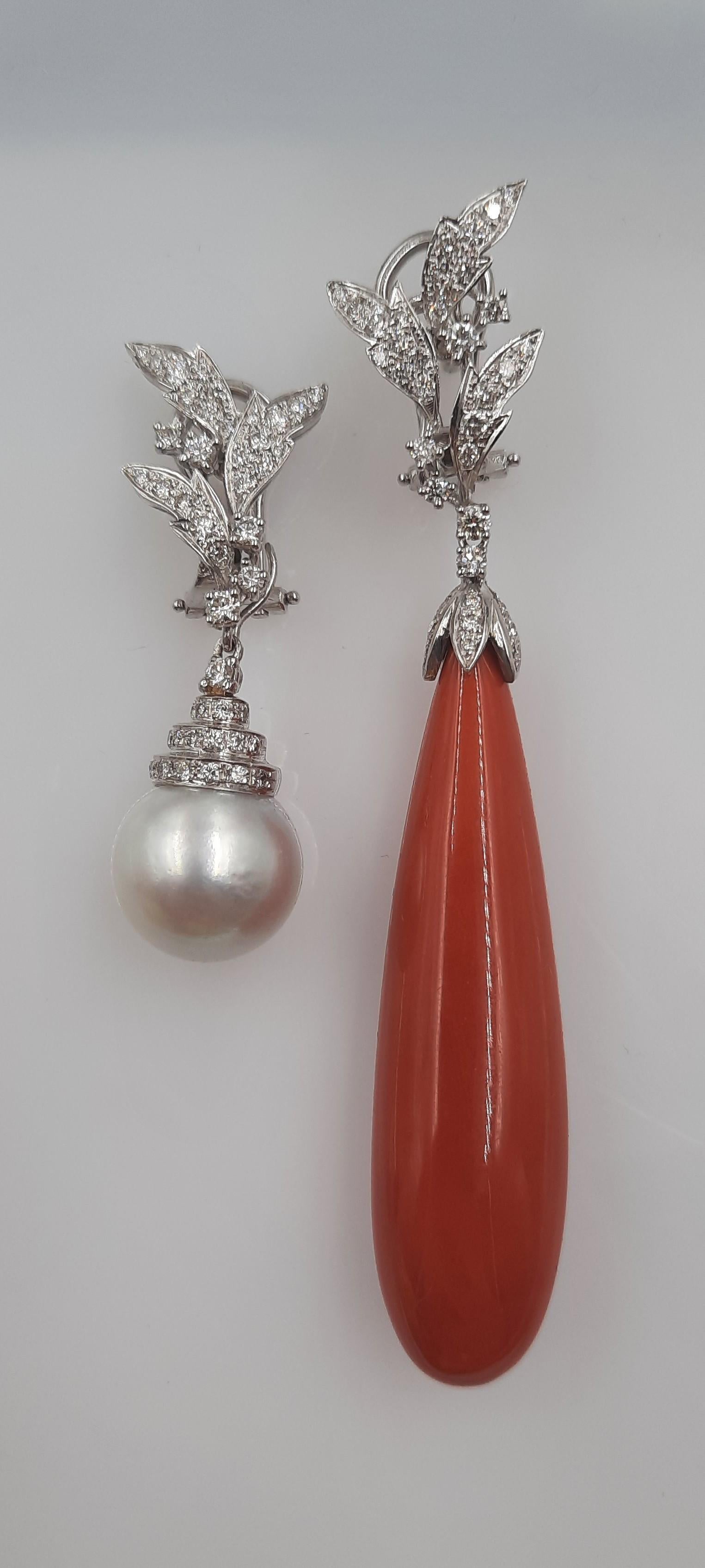Very elegant and big brilliant cut diamond (1.28 carats), red natural coral (22.4 grams), 18 carats white gold 
(9.5grams) drop earrings. Is it possible to wear the earrings without drops, or change the drop with other drop (amber, turquoise,