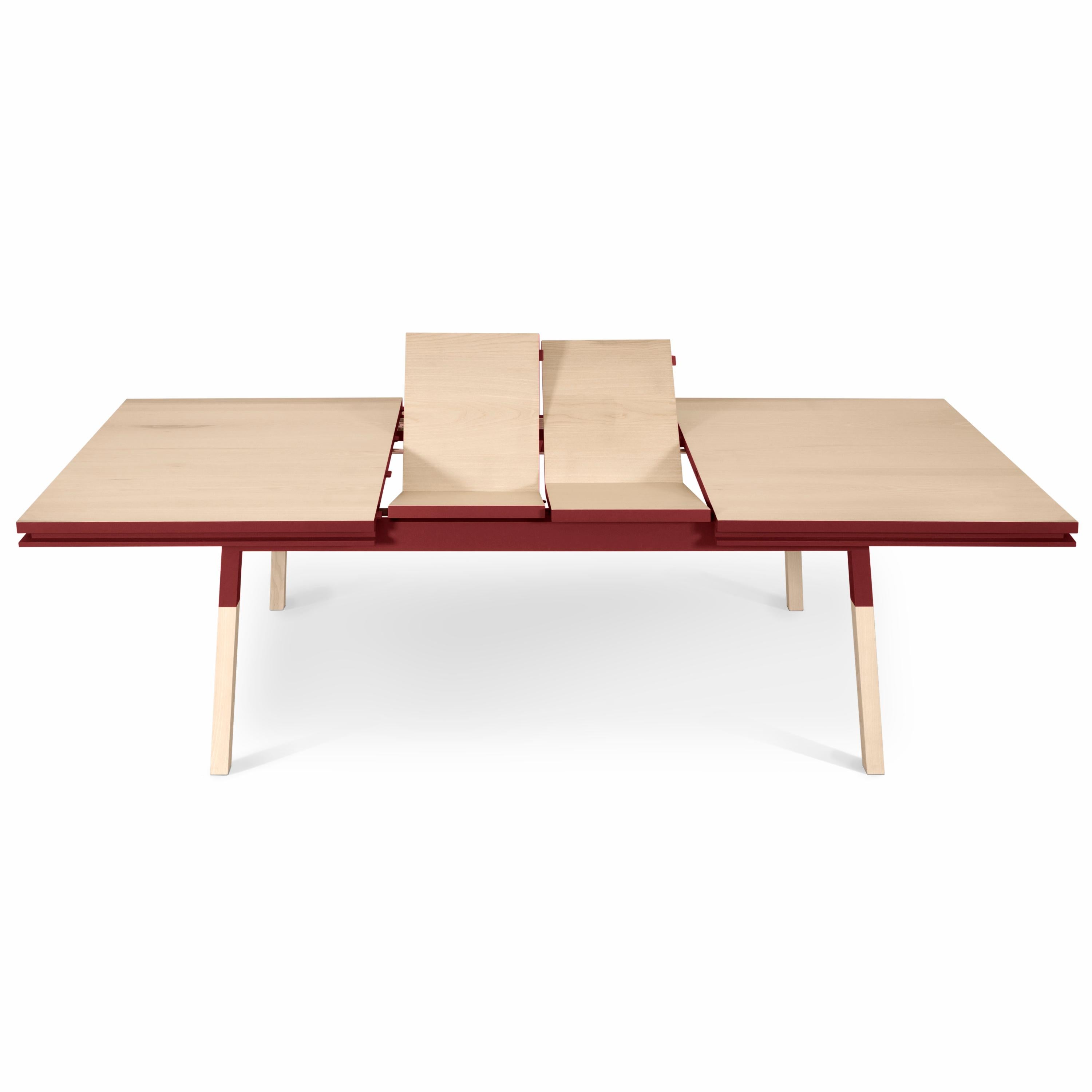 This rectangular dining table is proposed with 2 integrated and folded extensions. 

It is made of 100% solid ash wood from sustainably managed and PEFC certified French forests.

The 3 lengths are 180 cm / 70.9 in when the table is closed, 220 cm /