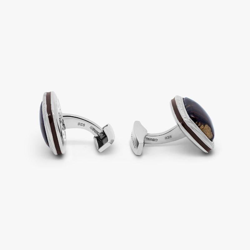 Red Oak Wood Cufflinks in Sterling Silver, Limited Edition

Fossilised red oak wood is hand-carved and set within and engraved square case with black enamel detailing, replicating the natural texture of wood. Fossilisation occurs when a red oak tree