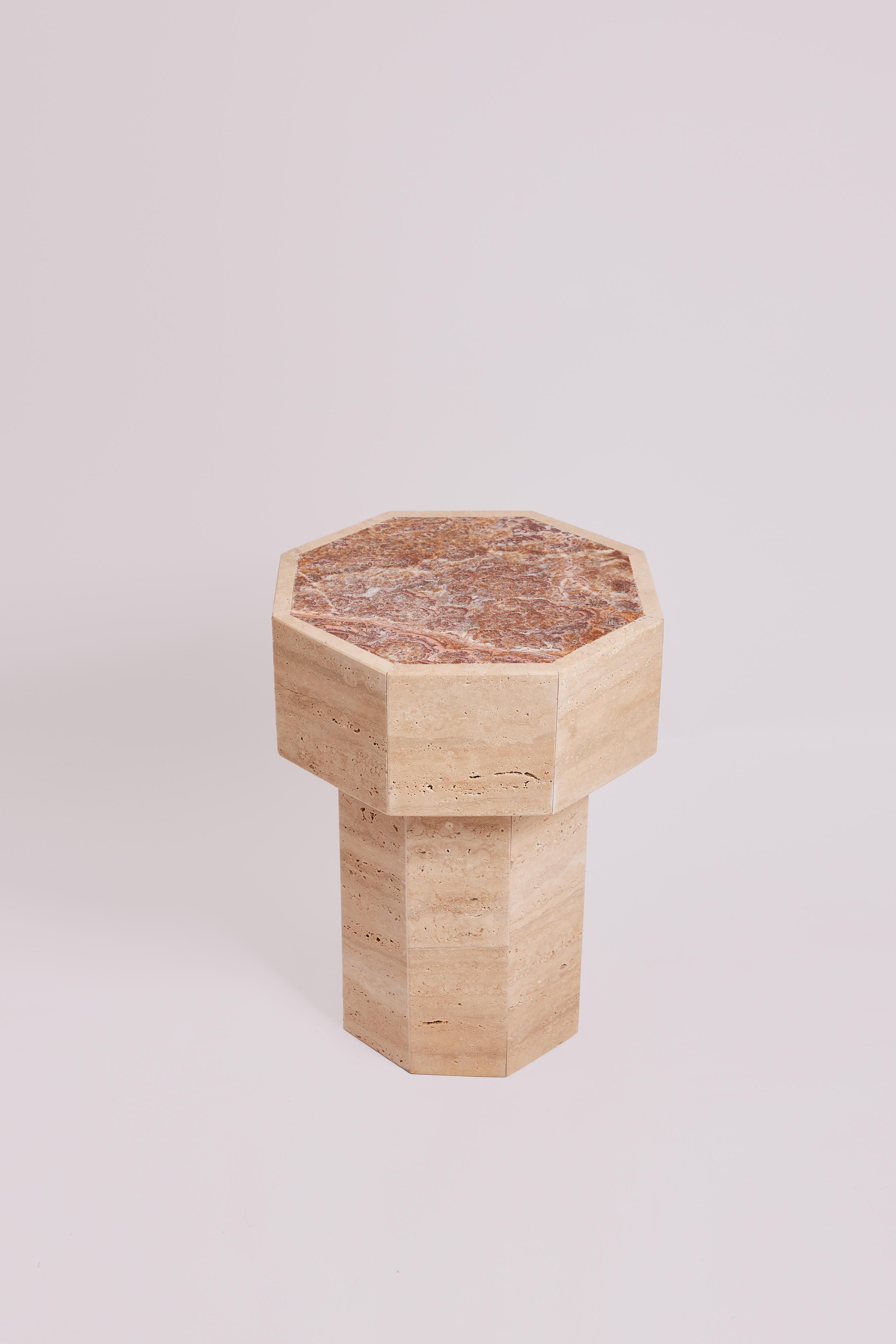 Red Onyx Gisele Side Table by Studio Gaia Paris
Dimensions: ⌀ 39 x H 50 cm
Materials: Red Onyx and Travertine

The Gisèle side table, in onyx and travertine, features two types of natural stones known for their unique beauty and durable properties.