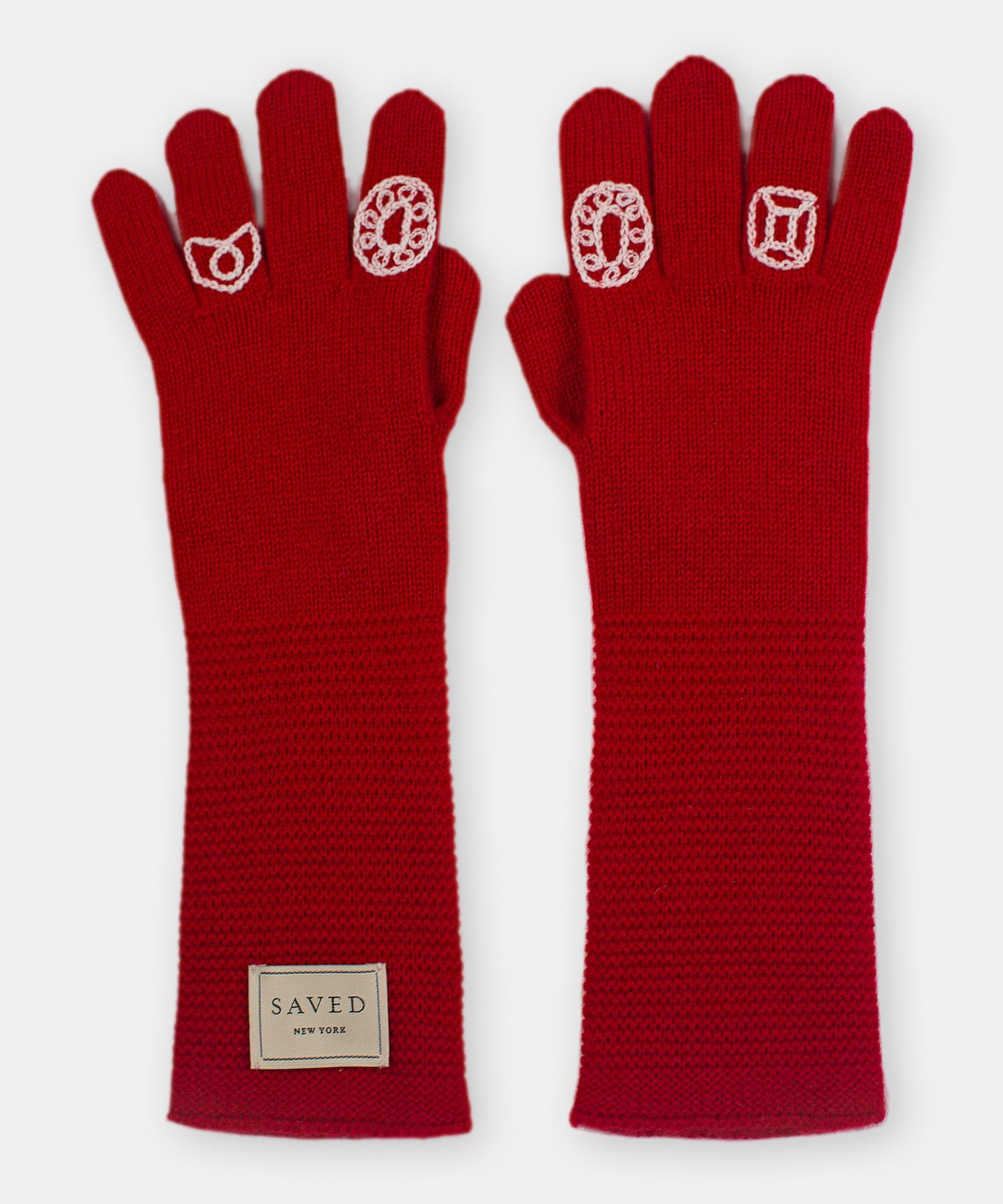 Red opera gloves by Saved, New York

Long, elegant length with hand embroidered details suitable for the theatre. One size.