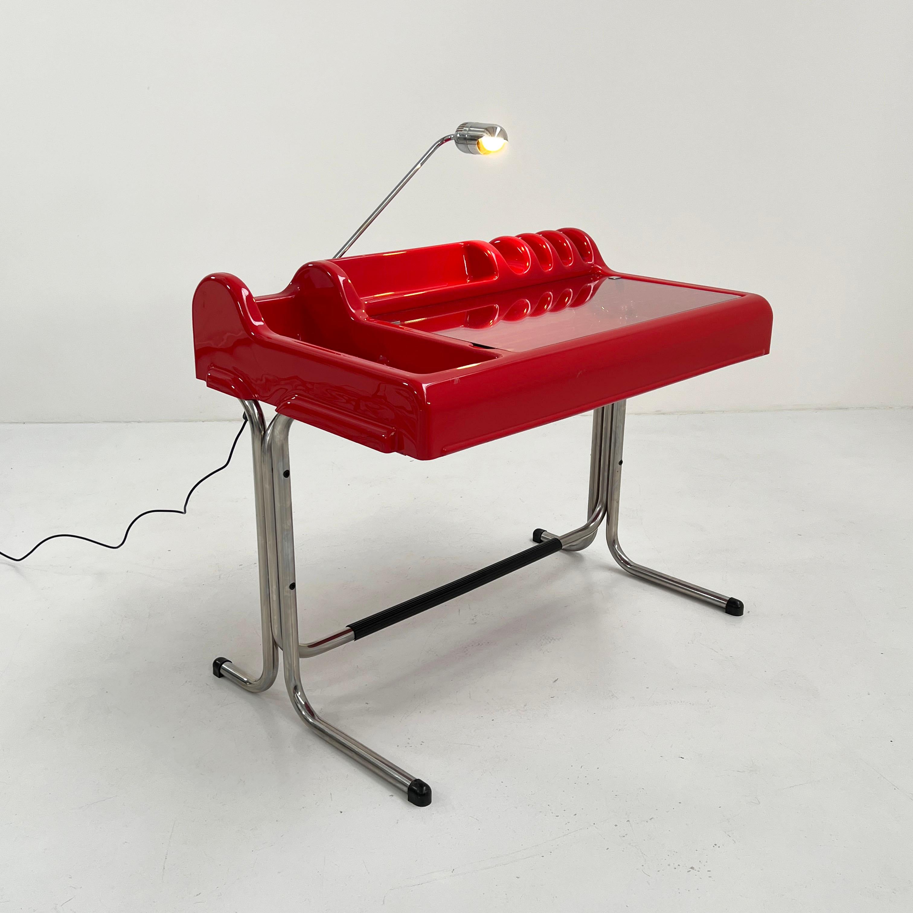 Designer - Vittorio Parigi & Nani Prina
Producer - Molteni
Model - Orix Desk 
Design Period - Seventies
Measurements - Width 100 cm x Depth 63 cm x Height 82 cm
Materials - Plastic, Steel
Color - Red, Silver
Electrical Properties - European Plug (up