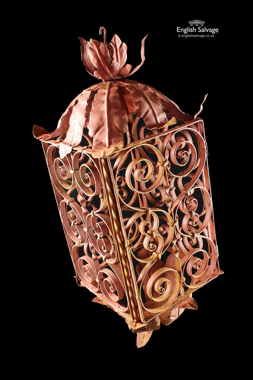Reclaimed red ornate metal hanging lantern with door opening, scroll design to sides and foliate detailing to top and bottom, small hanging hook.

No wiring or fittings.

All electrical work/installation must be undertaken by a qualified