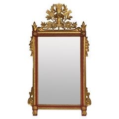 Miroir de style Louis XIV peint en rouge et doré au parchemin