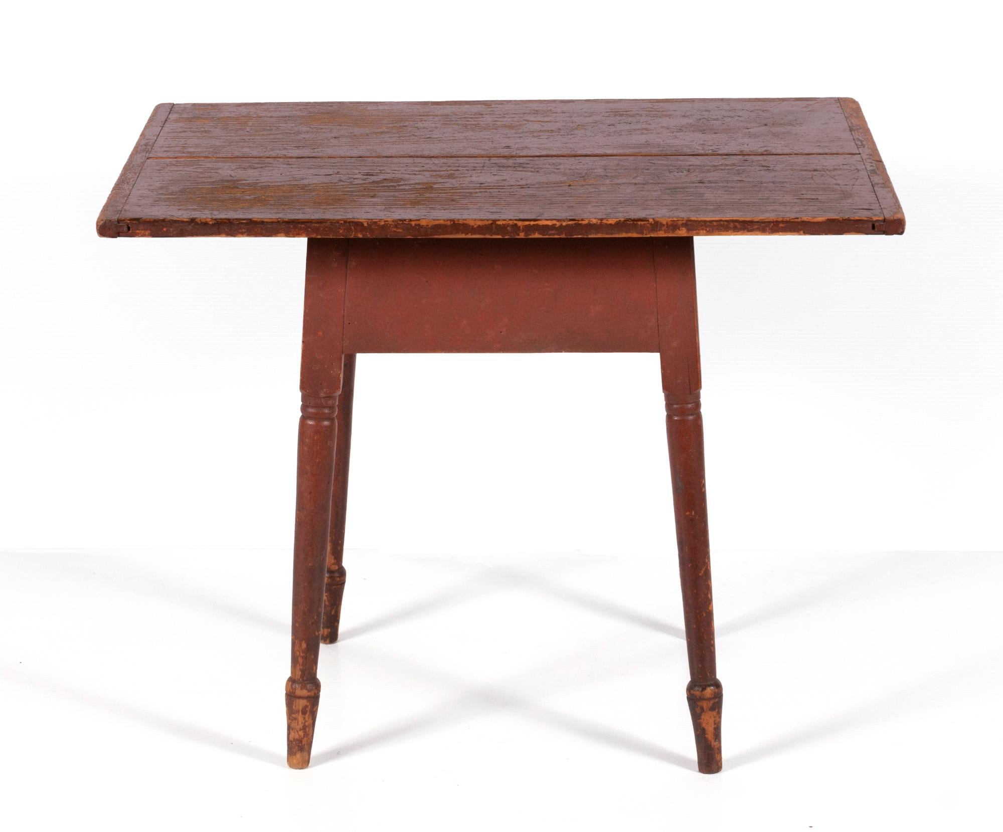 Beautiful, small scale, tavern or work table, with boldly splayed case and legs, the latter of which are finely turned and terminate in shapely, spade feet. The two-board top has breadboard ends and is original. Possibly of Maine origin, made circa