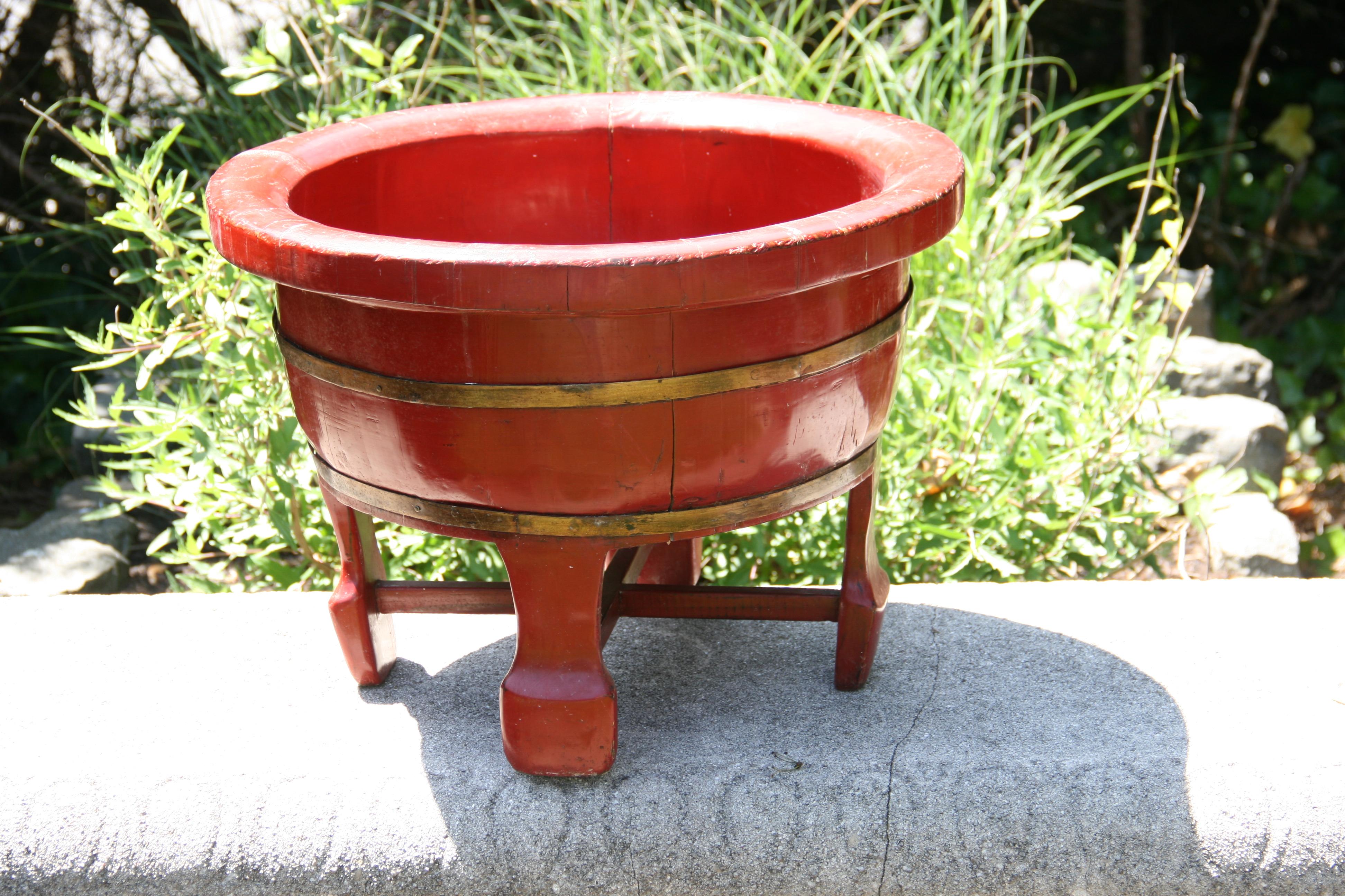 3-557 Large red painted Barrel footed plant stand with brass banding
Inside diameter 15.5