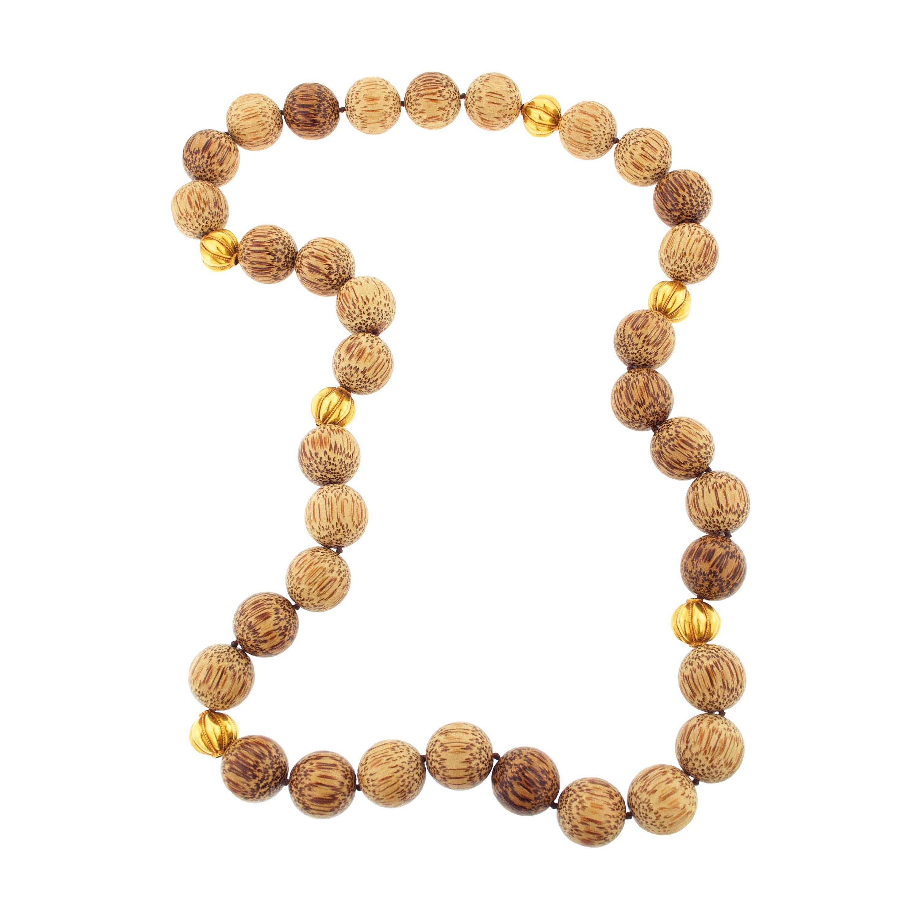 Red Palm Wood and Gold Bead Necklace For Sale