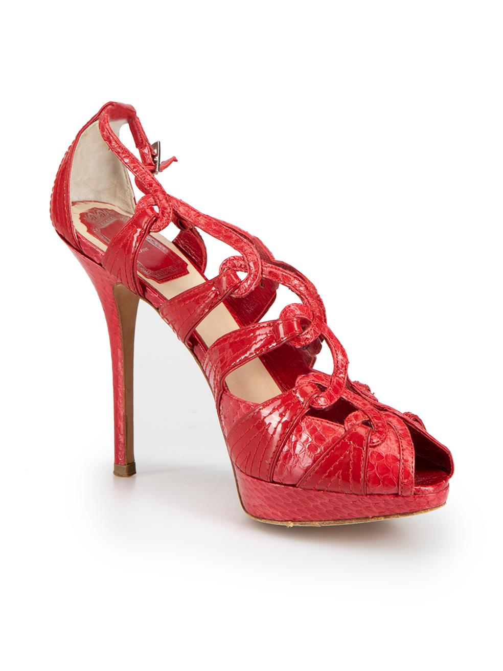 CONDITION is Very good. Minimal wear to sandals is evident. Minimal wear to back of heels and outer soles on this used Christian Dior designer resale item. 



Details


Red

Patent leather and python leather

Strappy sandals

Contrast panel

Peep