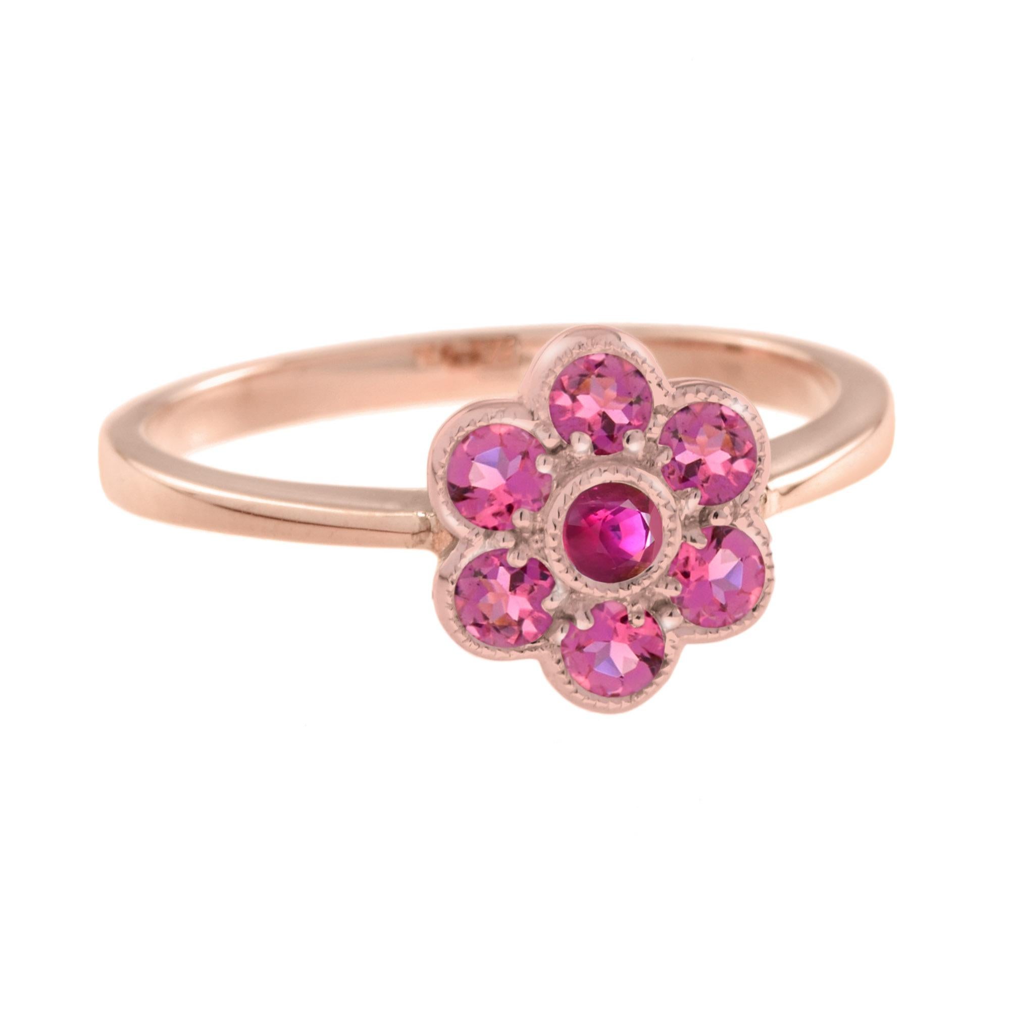A stunning and beautiful design of the iconic Edwardian style flower cluster ring, featuring round ruby for its center and six round cut striking pink tourmaline beautifully set into 14k rose gold.
Ring Information
Style: Edwardian
Metal: 14K Rose