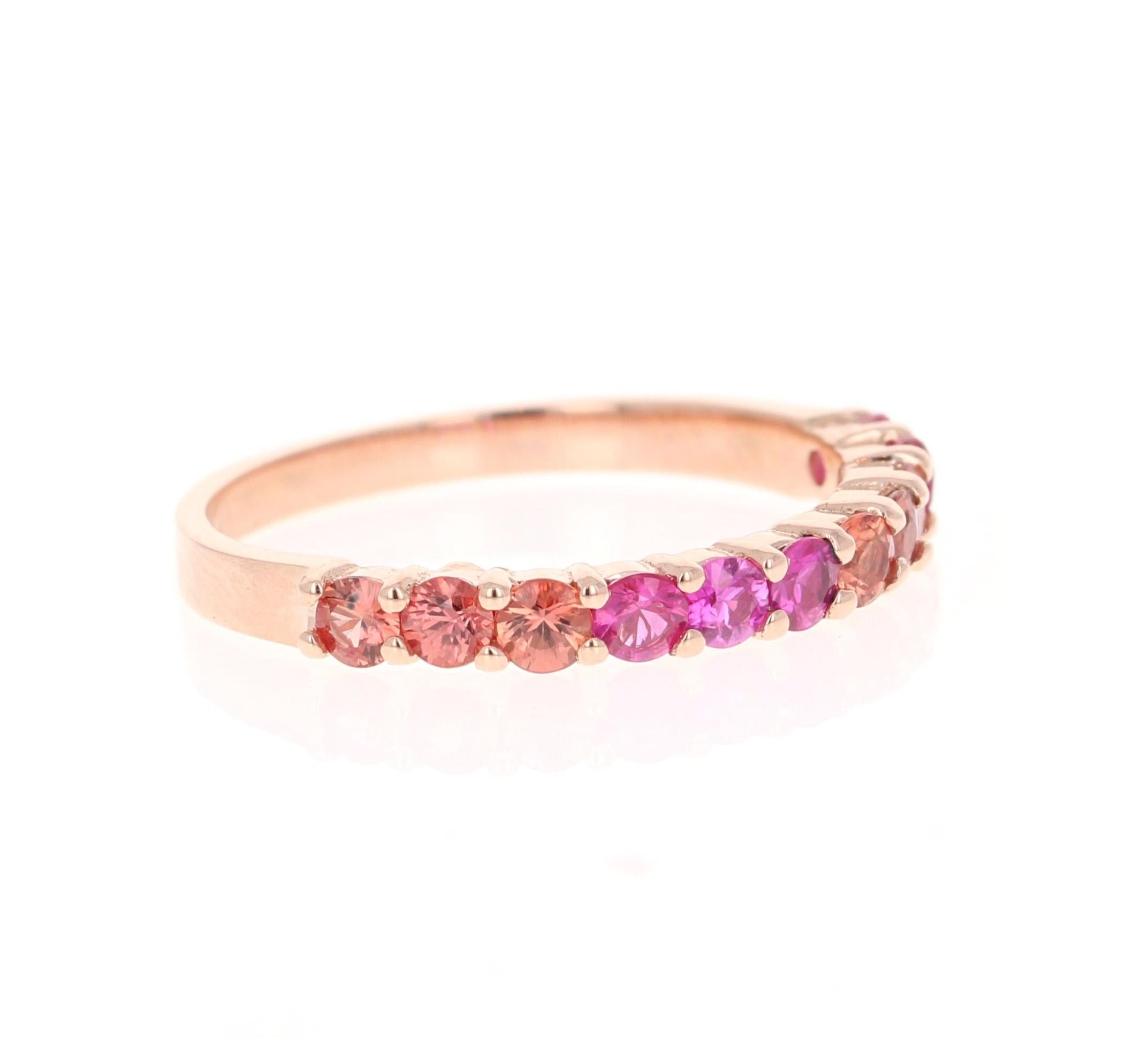 There are 11 Multicolored Genuine Red and Pink Sapphires in this band that weigh 1.03 Carats.  
It is perfect for everyday wear and looks amazing stacked or alone. 
This band is created in 14 Karat Rose Gold and weighs approximately 1.9 grams
The