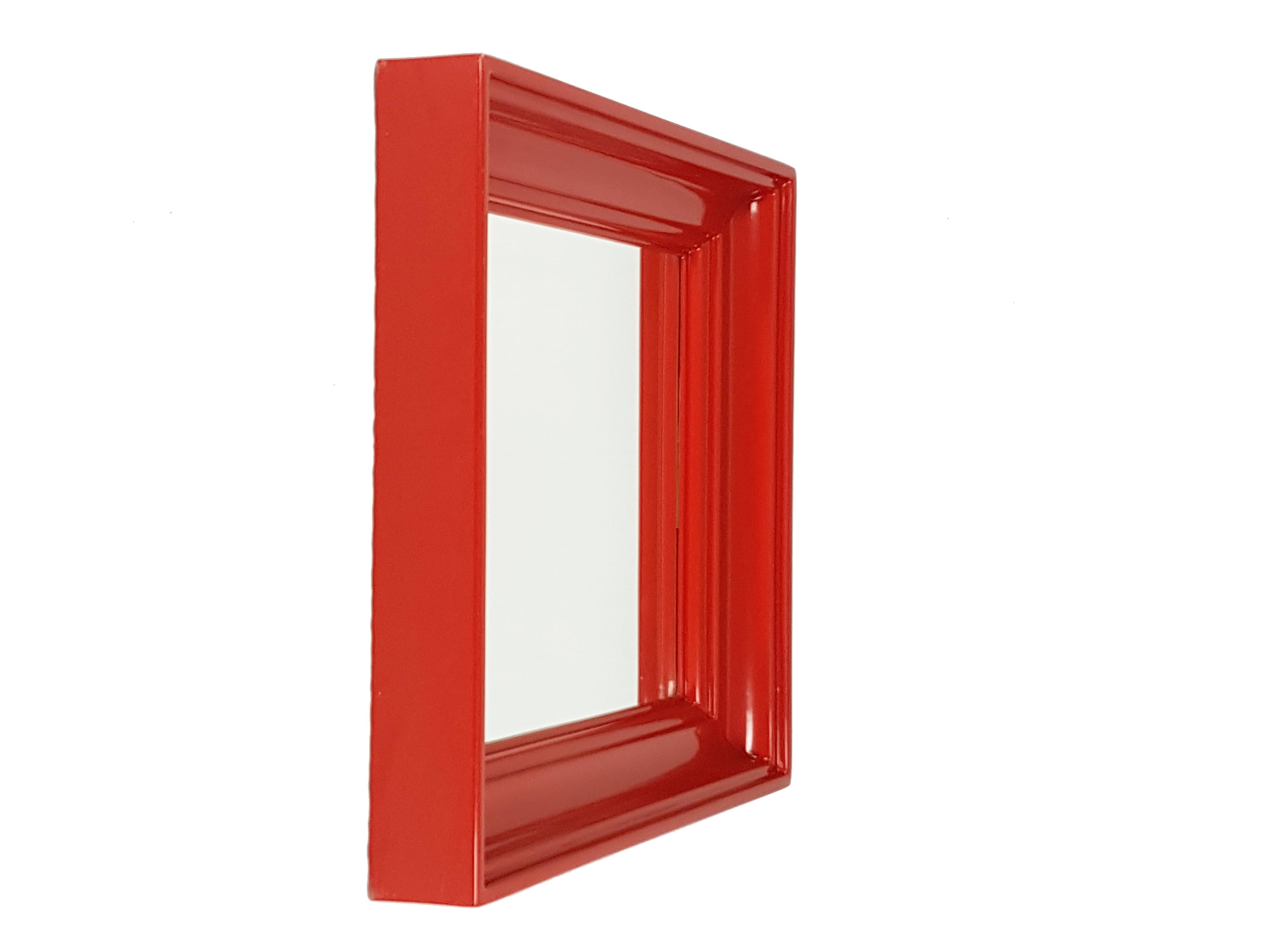 red wall mirror