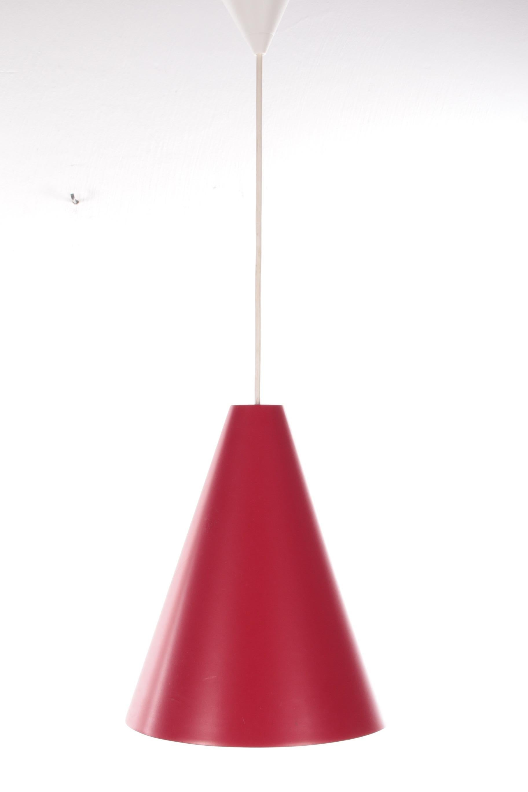 Red point hanging lamp with glass in it made in the 1960s.

This is an early model hanging lamp once made for Ikea.

Made of metal with a white glass kind of screen in the 60s.

This lamp is in excellent condition and could last for years to