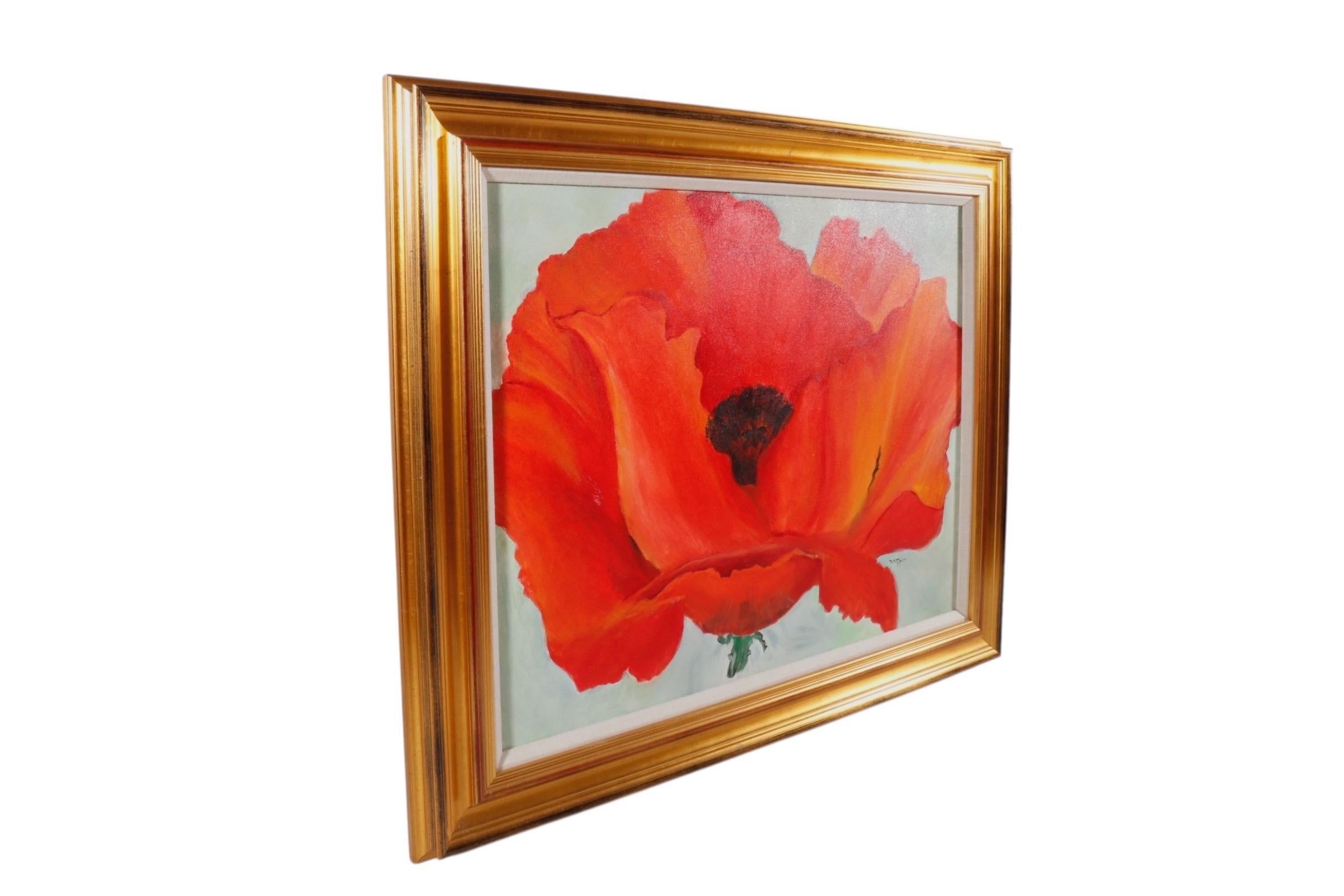 An original signed oil on canvas replica of Georgia O’Keefes 1927 painting ‘Red Poppy’. The canvas is filled with soft, undulating forms, in saturated shades of red and black. The natural forms show a magnified, singular red poppy, with a touch of