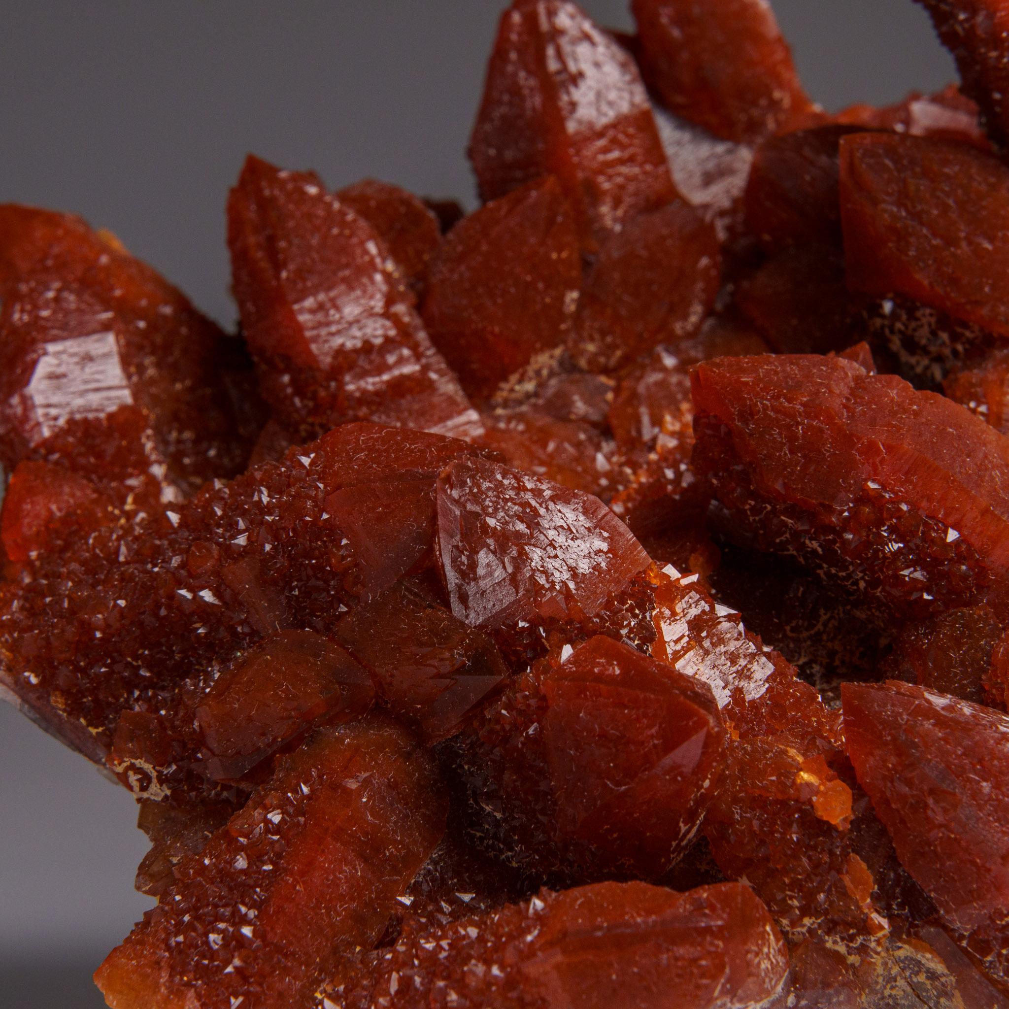 Red Quartz Hematite crystal cluster from Izizauen Alnif, Tarhbalt, Morocco. Cylindrical stalactite of calcite crystals mixed with red hematite.

Hematoid Quartz contains both the amplification properties of Quartz with the balance and stability of