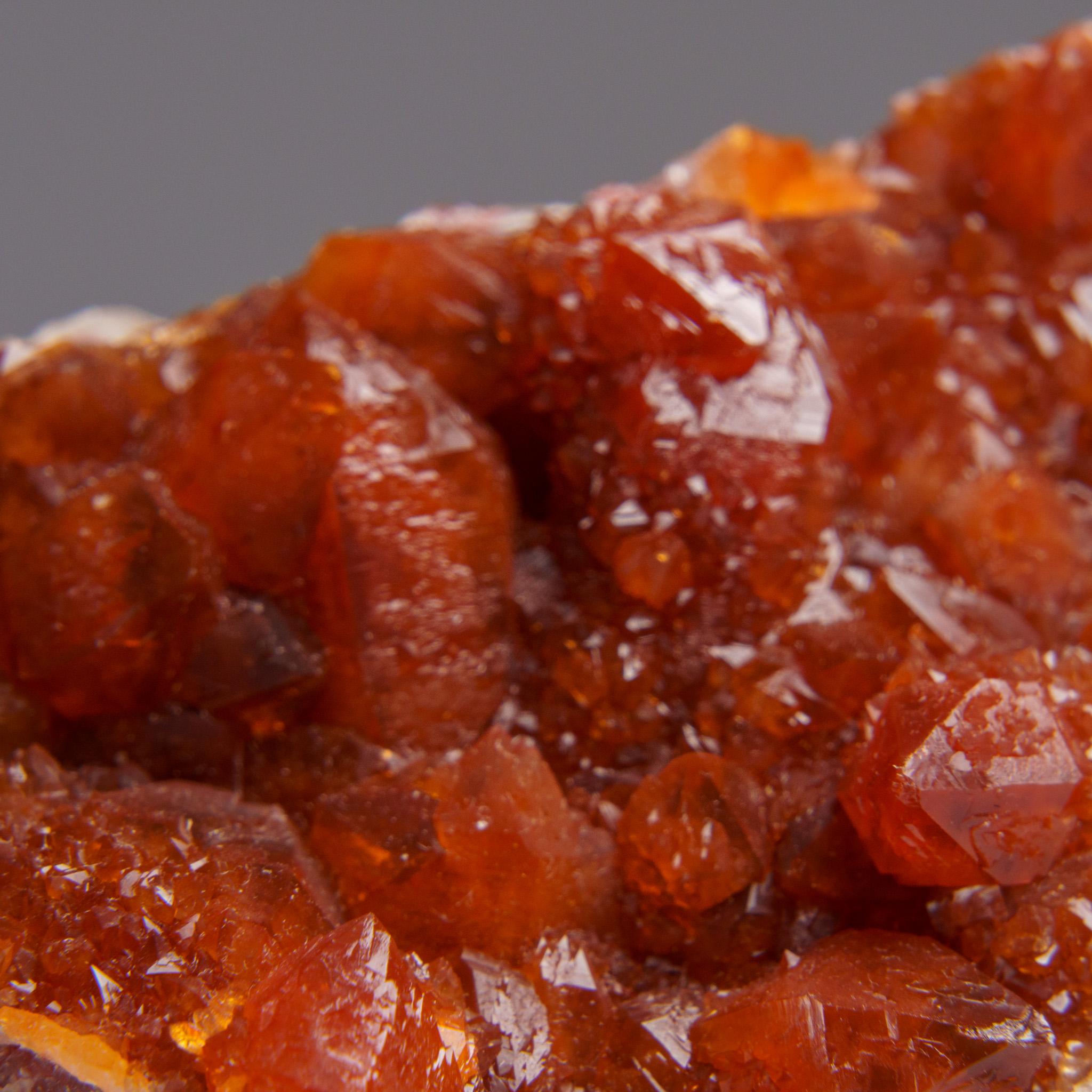 Red Quartz Hematite crystal cluster from Izizauen Alnif, Tarhbalt, Morocco. Cylindrical stalactite of calcite crystals mixed with red hematite.

Hematoid Quartz contains both the amplification properties of Quartz with the balance and stability of