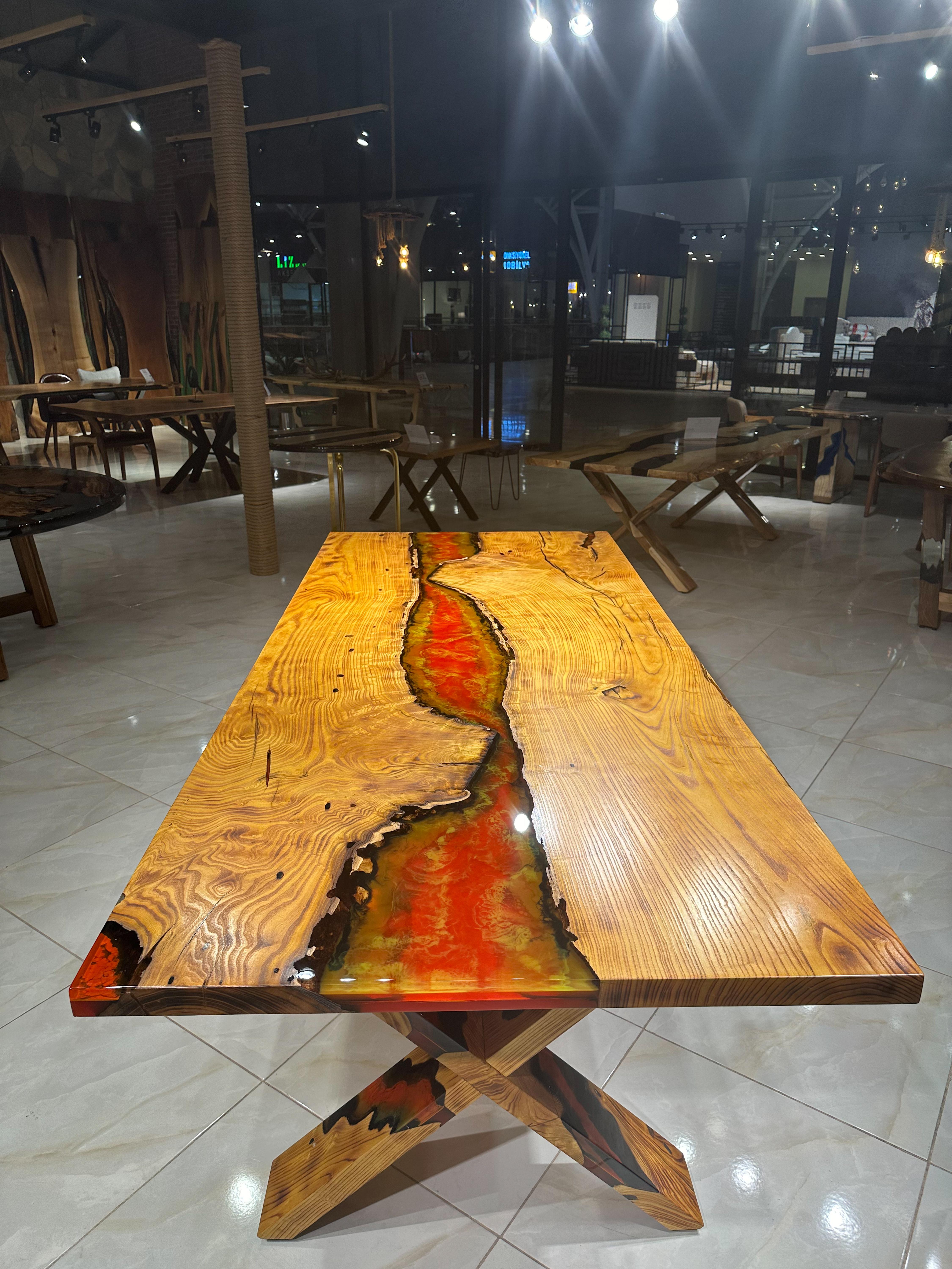 Table en bois en résine époxy rouge - Dimensions et couleurs personnalisées disponibles !

Cette table combine harmonieusement la chaleur du bois naturel et la touche moderne de l'époxy rouge et jaune. C'est une pièce maîtresse magnifique pour