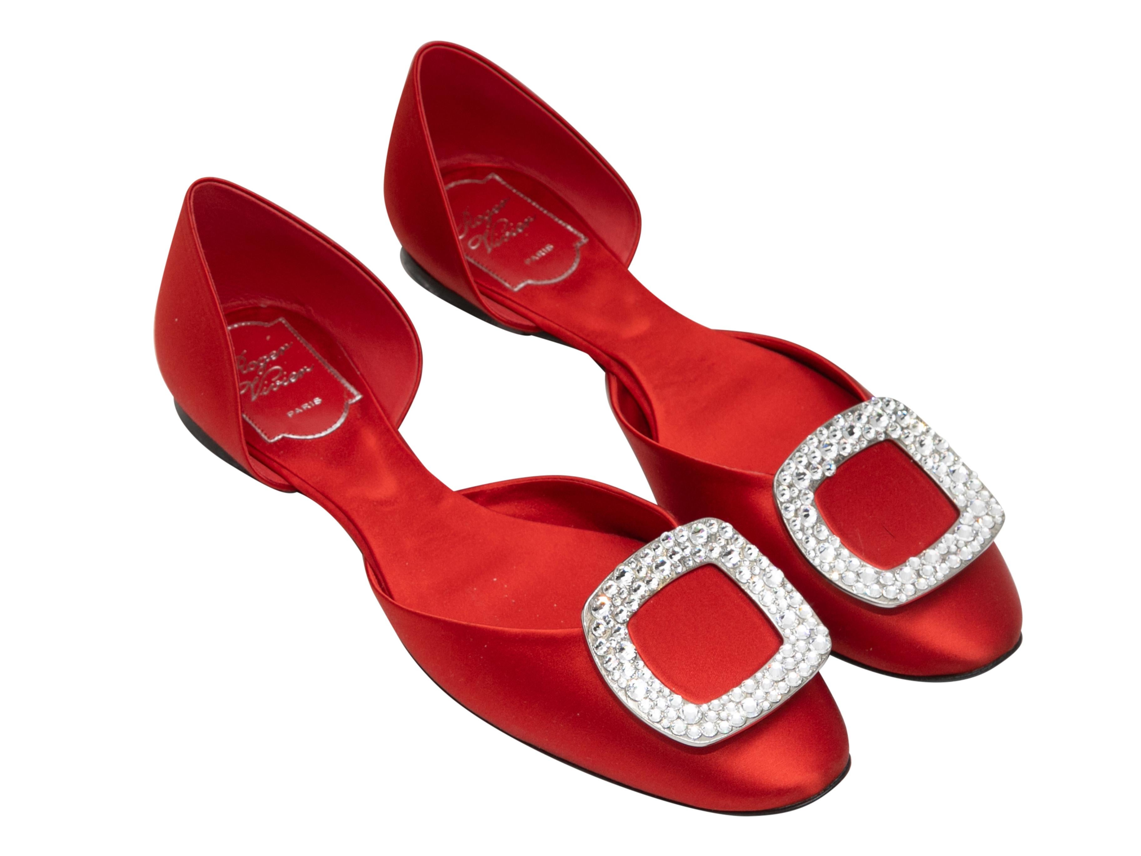 Red satin d'Orsay ballet flats by Roger Vivier. Crystal-embellished silver-tone buckle accents at tops. 

Designer Size: 39
US Recommended Size: 9

