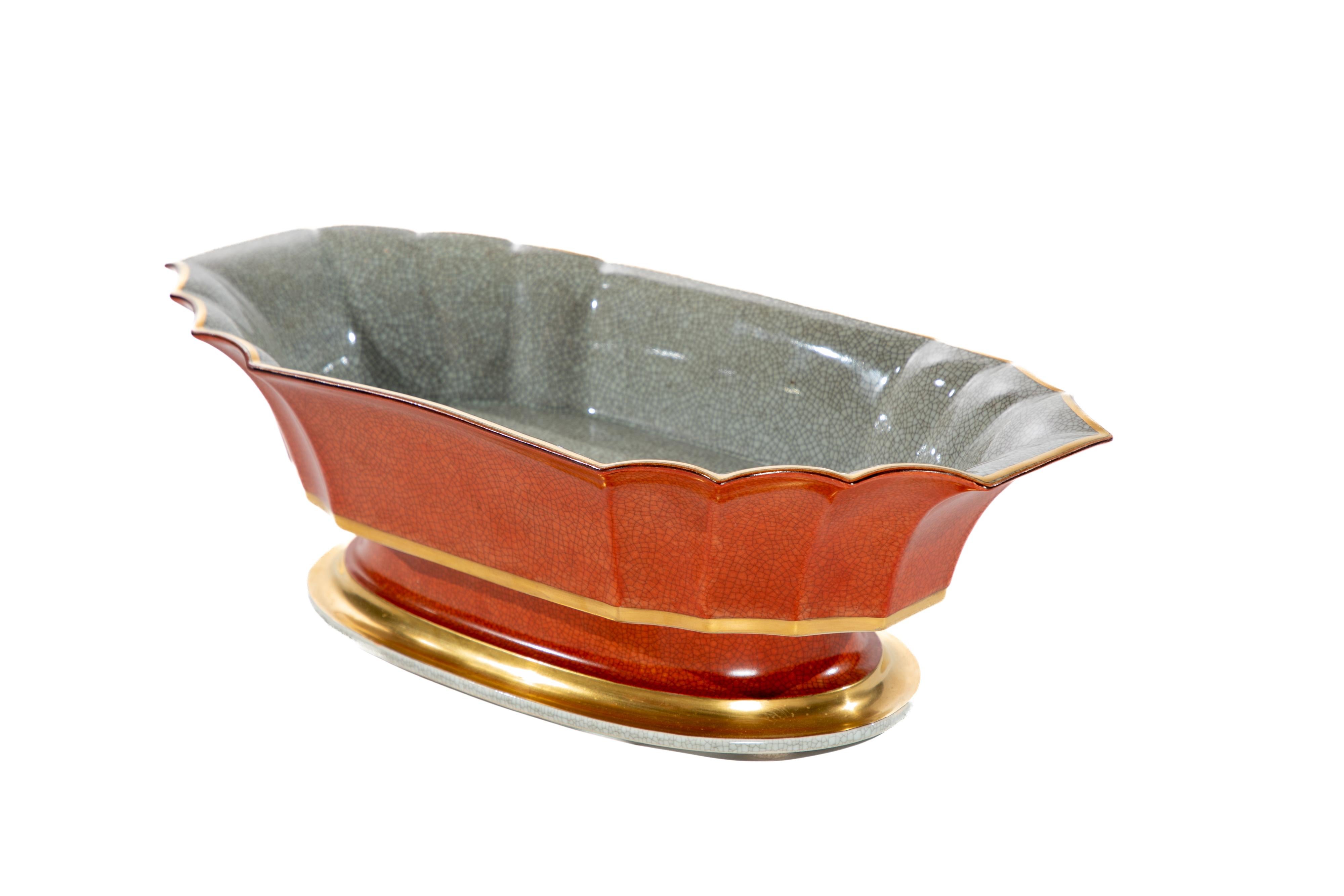 Red Royal Copenhagen scalloped edge octagonal bowl.  Faux shagreen glaze.  
Circa 1925