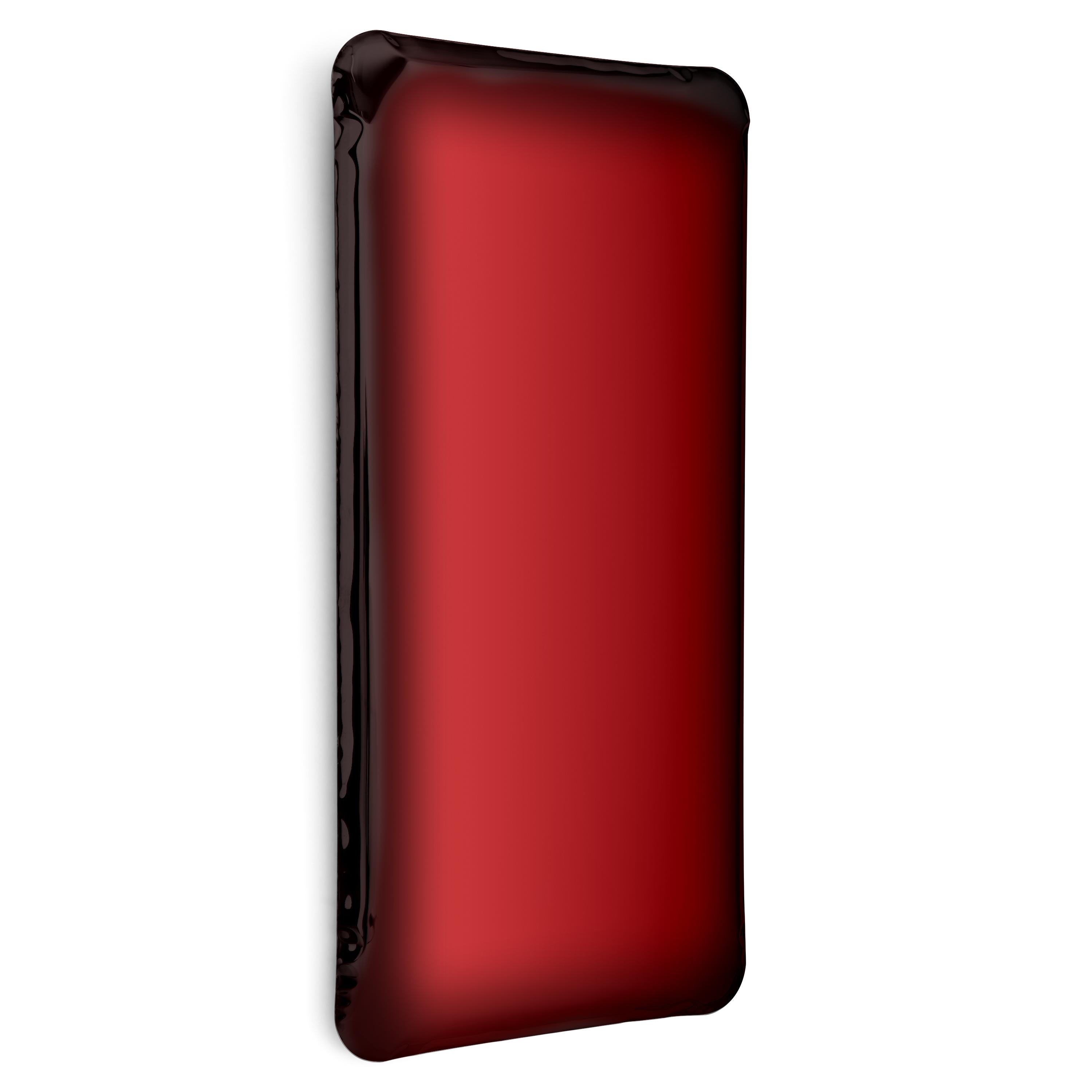 Red Rubin Tafla Q2 sculptural wall mirror by Zieta
Dimensions: D 6 x W 60 x H 120 cm 
Material: Stainless steel. 
Finish: Red Rubin.
Available in finishes: Stainless Steel, Deep Space Blue, Emerald, Saphire, Saphire/Emerald, Dark Matter, and Red