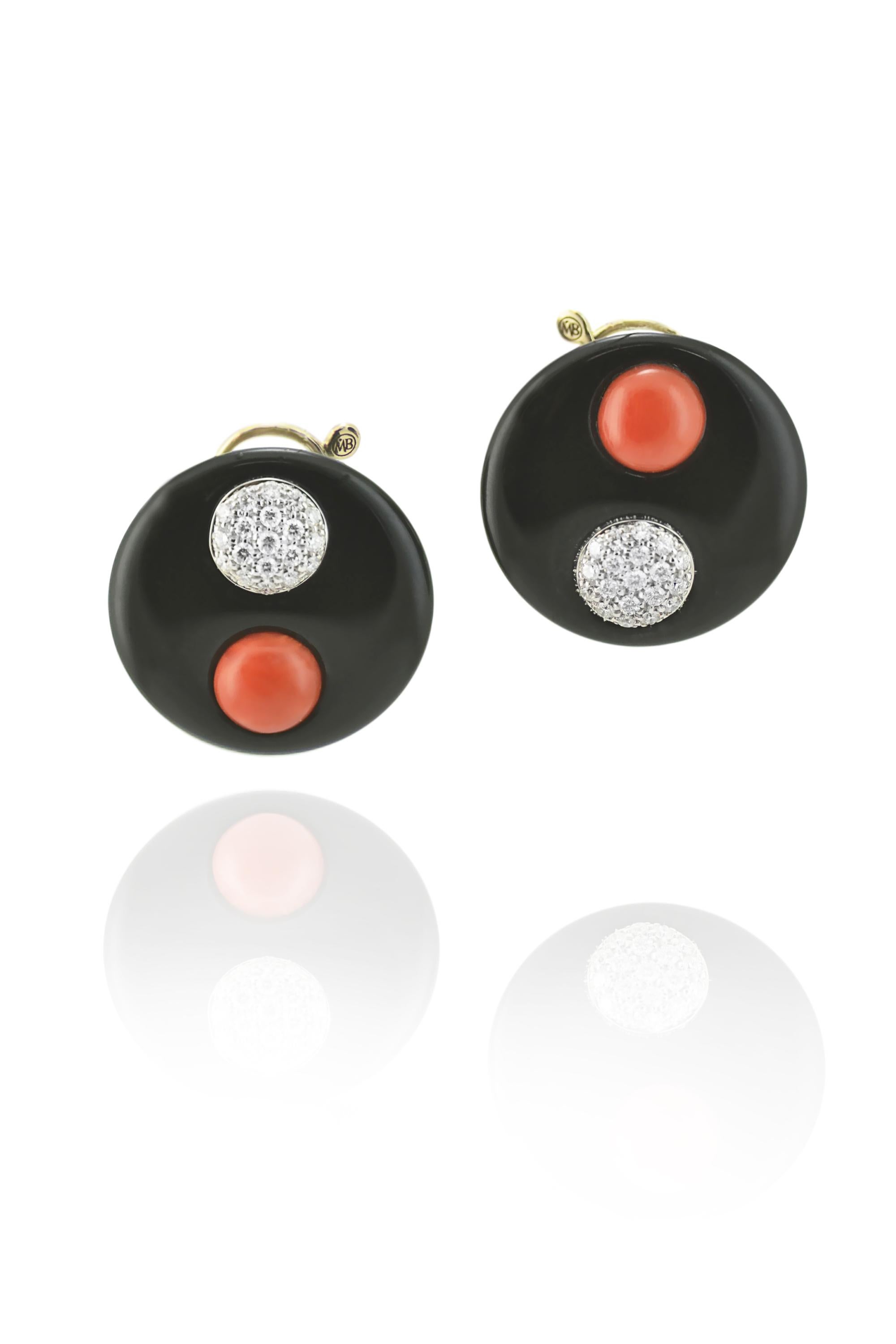 Stylish earclips designed and handcrafted in Margherita Burgener family workshop, Italy.
Round onyx discs,  featuring a diamond pavé detail and a round red rubrum coral botton.

Fitting and clips for pierced ears - on request we offer complimentary