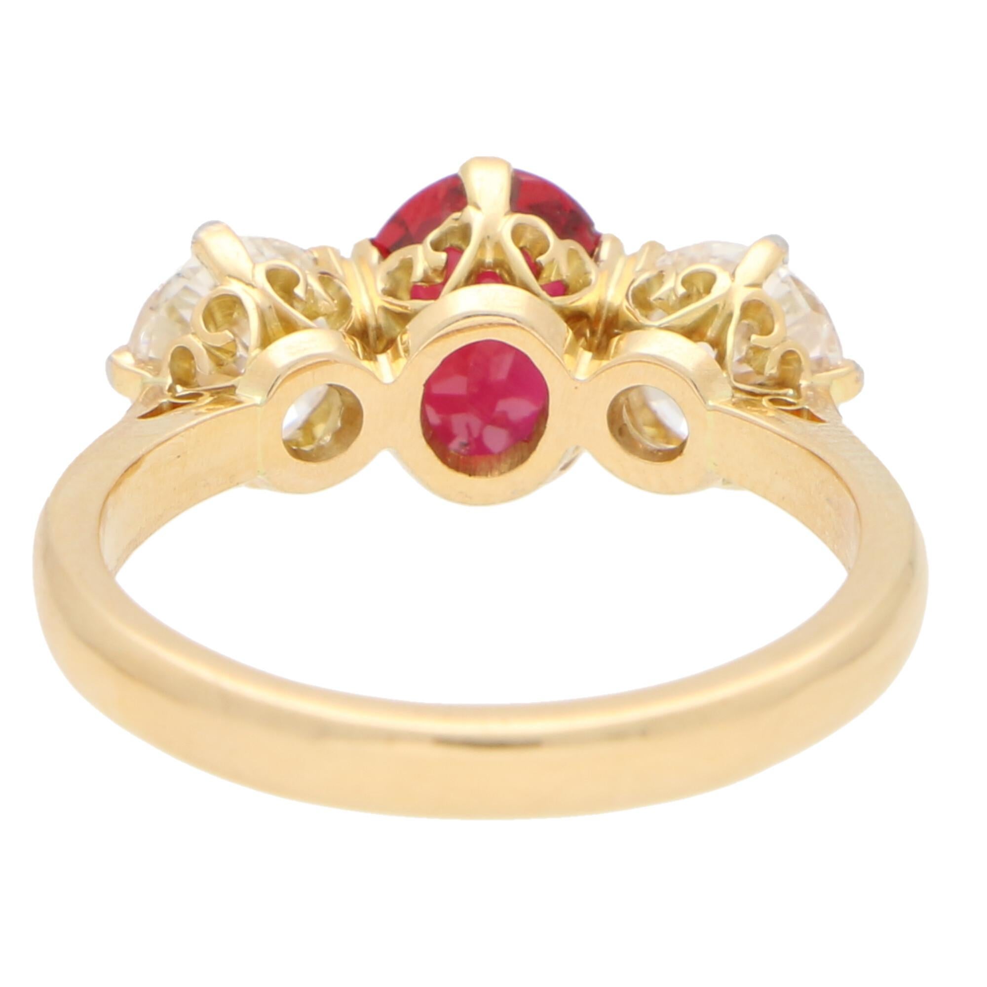 Oval Cut Red Ruby and Diamond Three-Stone Engagement Ring Set in 18 Karat Yellow Gold For Sale