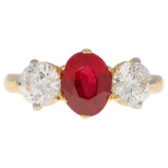 Red Ruby and Diamond Three-Stone Engagement Ring Set in 18 Karat Yellow Gold