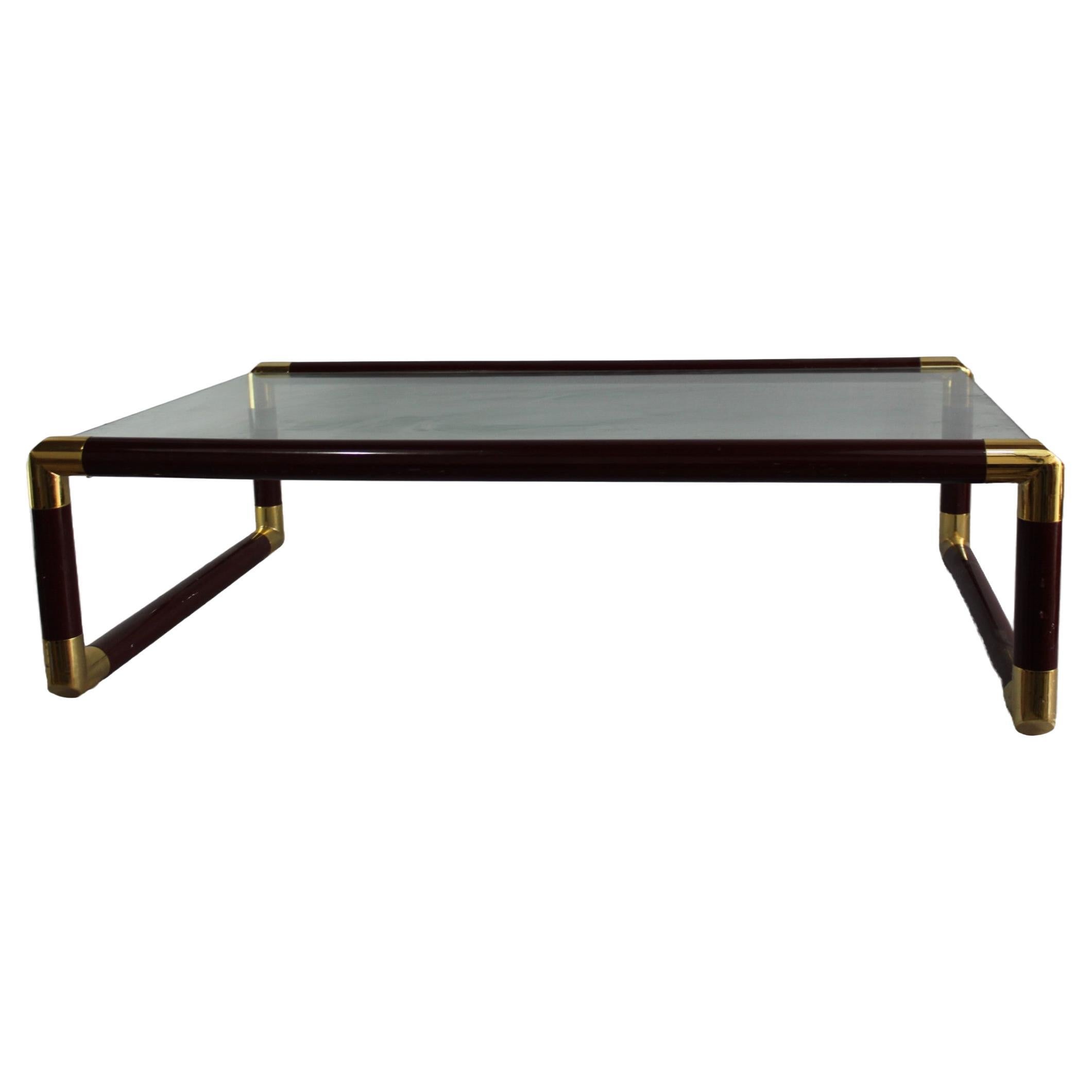 red ruby coffee table, 1980 italian, laquared wood and incredible patina brass For Sale