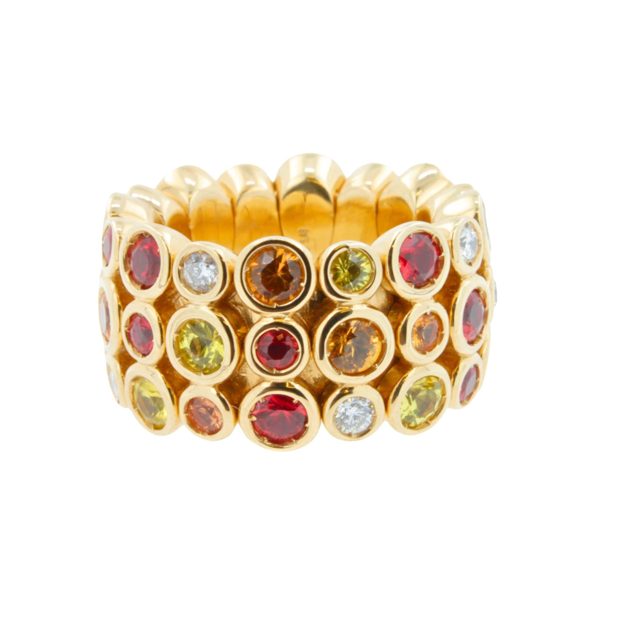 Multi Color Sunset Fire Eternity Patterns Ring

Red Ruby Orange Yellow Sapphire Diamond Eternity Band 18 Karat Yellow Gold Ring 

Jewels inspired by the colourful Art Deco movement. Lively designs and colorful Interpretations in a triple row