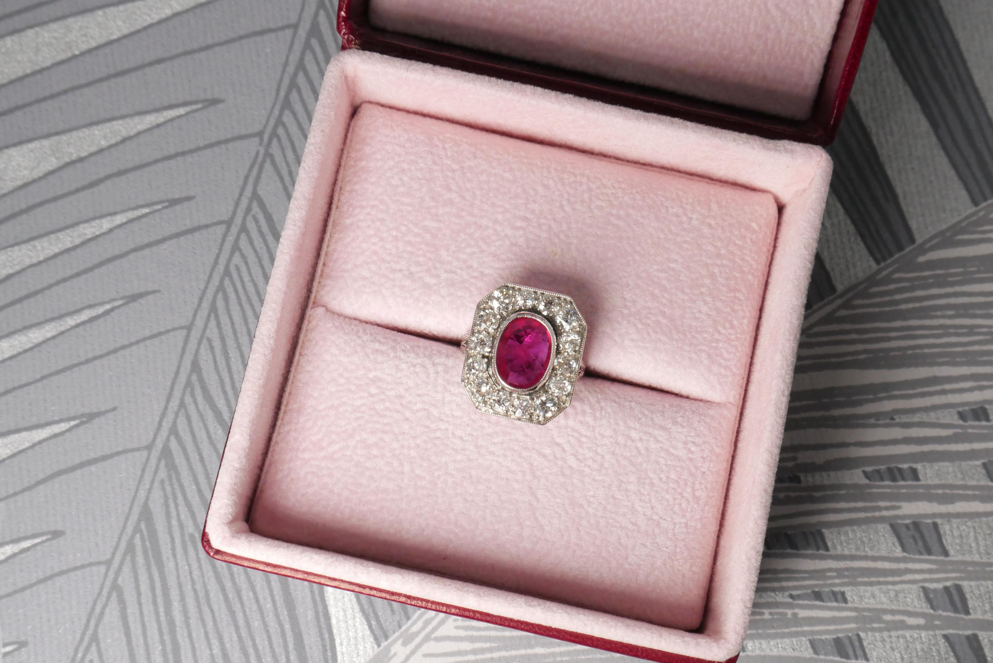 Oval Cut Red Ruby Ring with White Diamond Surround For Sale