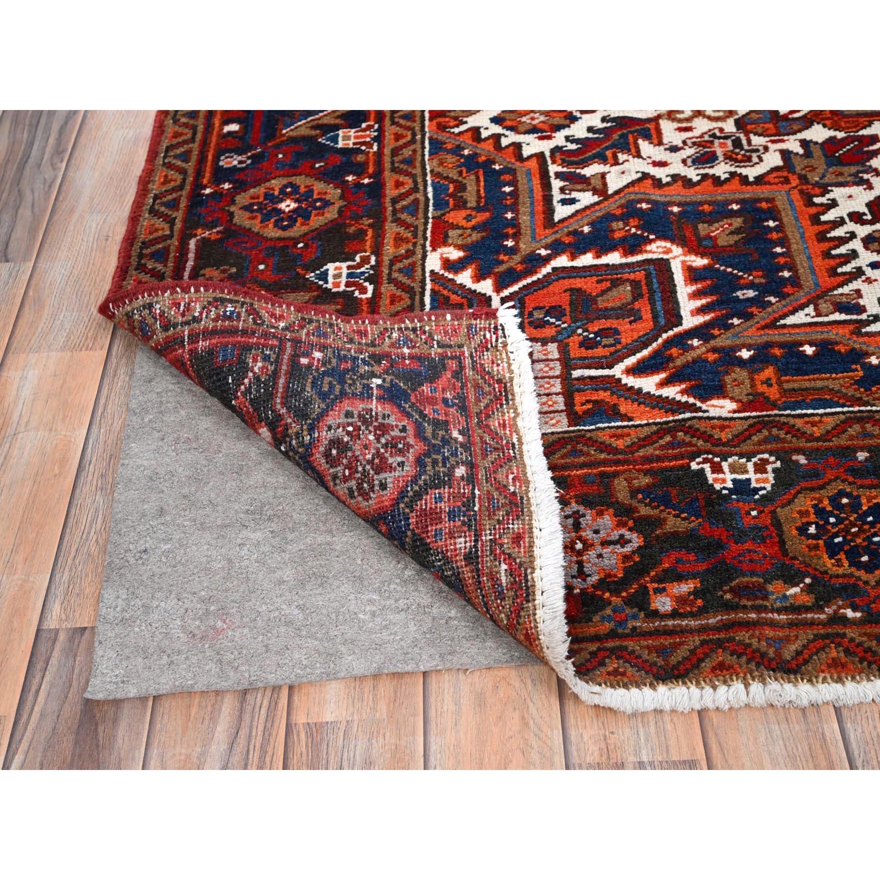 Mid-20th Century Red Rustic Feel Worn Wool Hand Knotted Vintage Persian Heriz Village Motif Rug For Sale