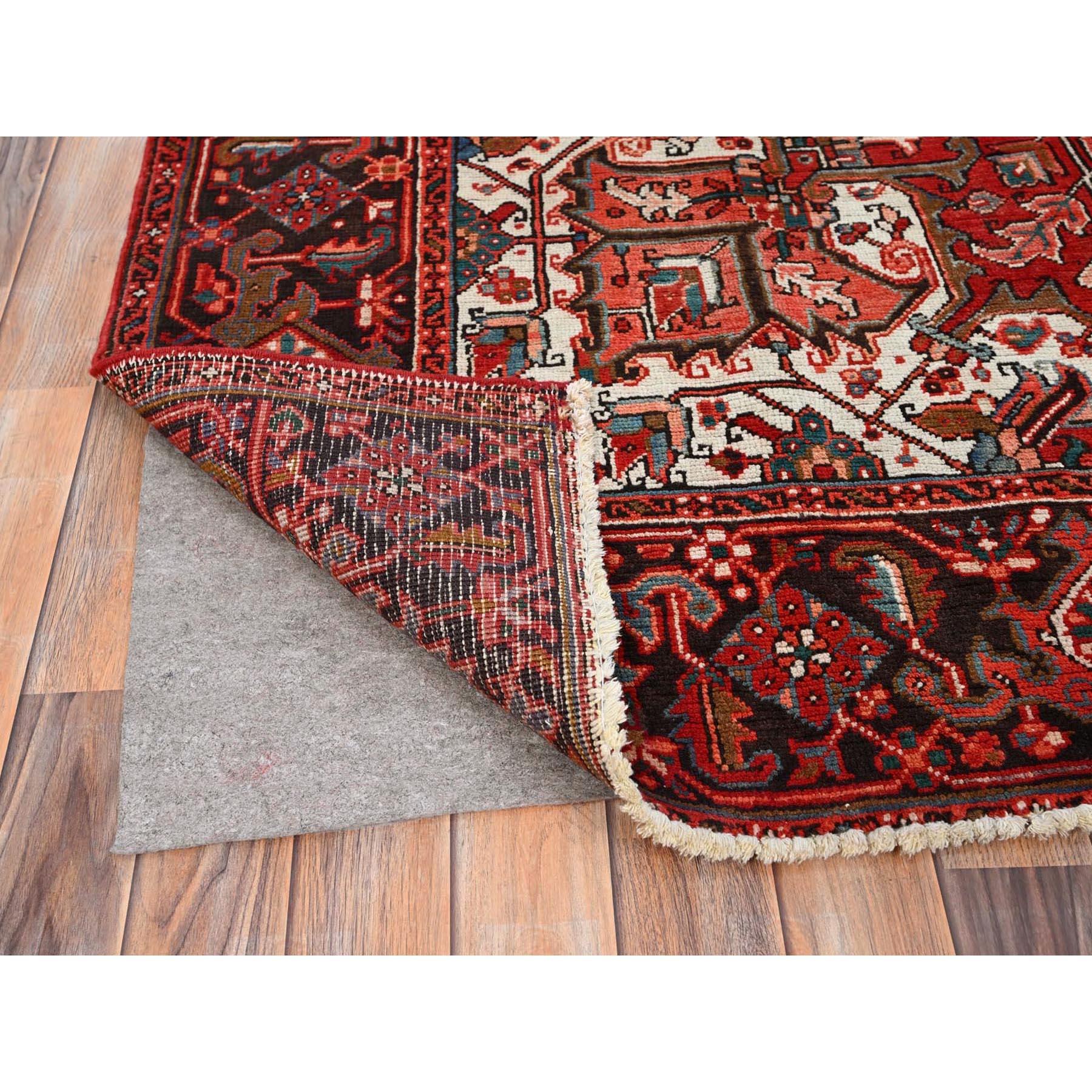 Mid-20th Century Red Rustic Look Worn Wool Hand Knotted Vintage Persian Heriz Tribal Ambience Rug For Sale