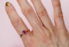 Deep Pink Sapphire Solitaire Ring in 18 Karat Yellow Gold