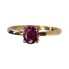 Bague solitaire en or jaune 18 carats avec saphir rose profond