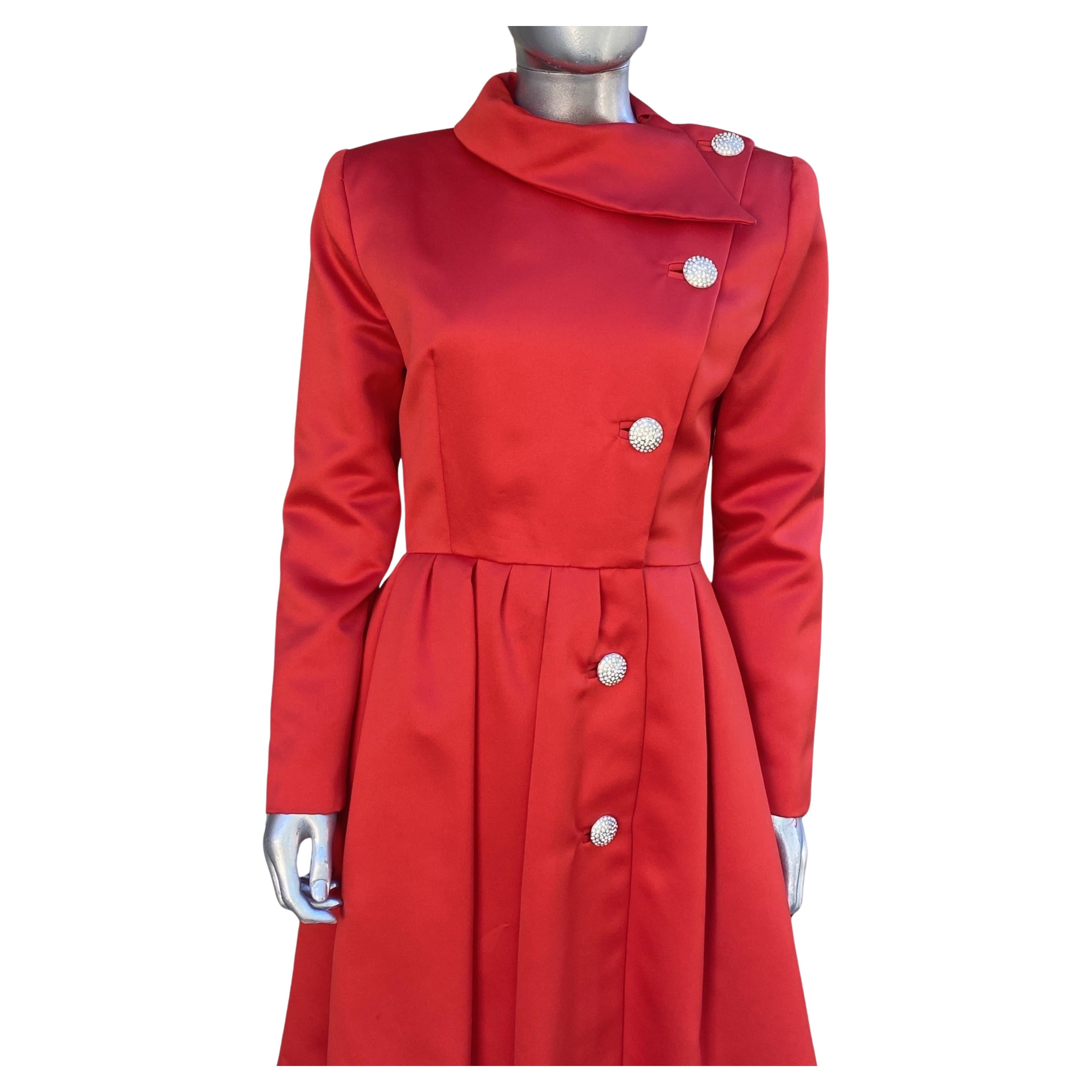 This dress is the most perfect vintage class ic and chic thing to wear for a holiday party. We are a big fan of Victor Costa designs and this beauty was purchased at Neiman Marcus in Beverly Hills by the original owner. The coat dress is done in the
