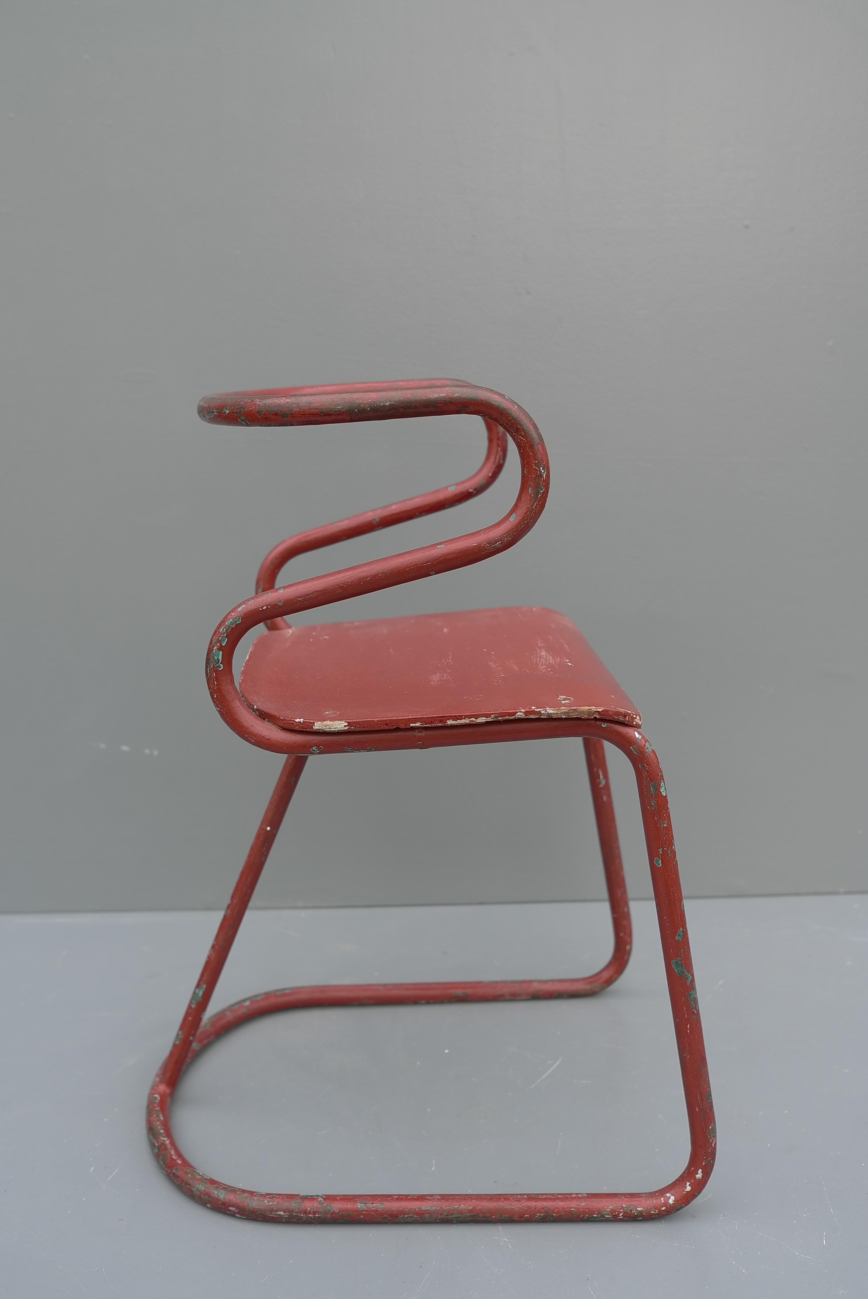 Red Sculptural Tubular Steel and Wood Mid-Century Modern Children Chair, 1950's For Sale 2