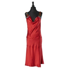Red silk cocktail dress with leather shoulder straps and beads John Galliano