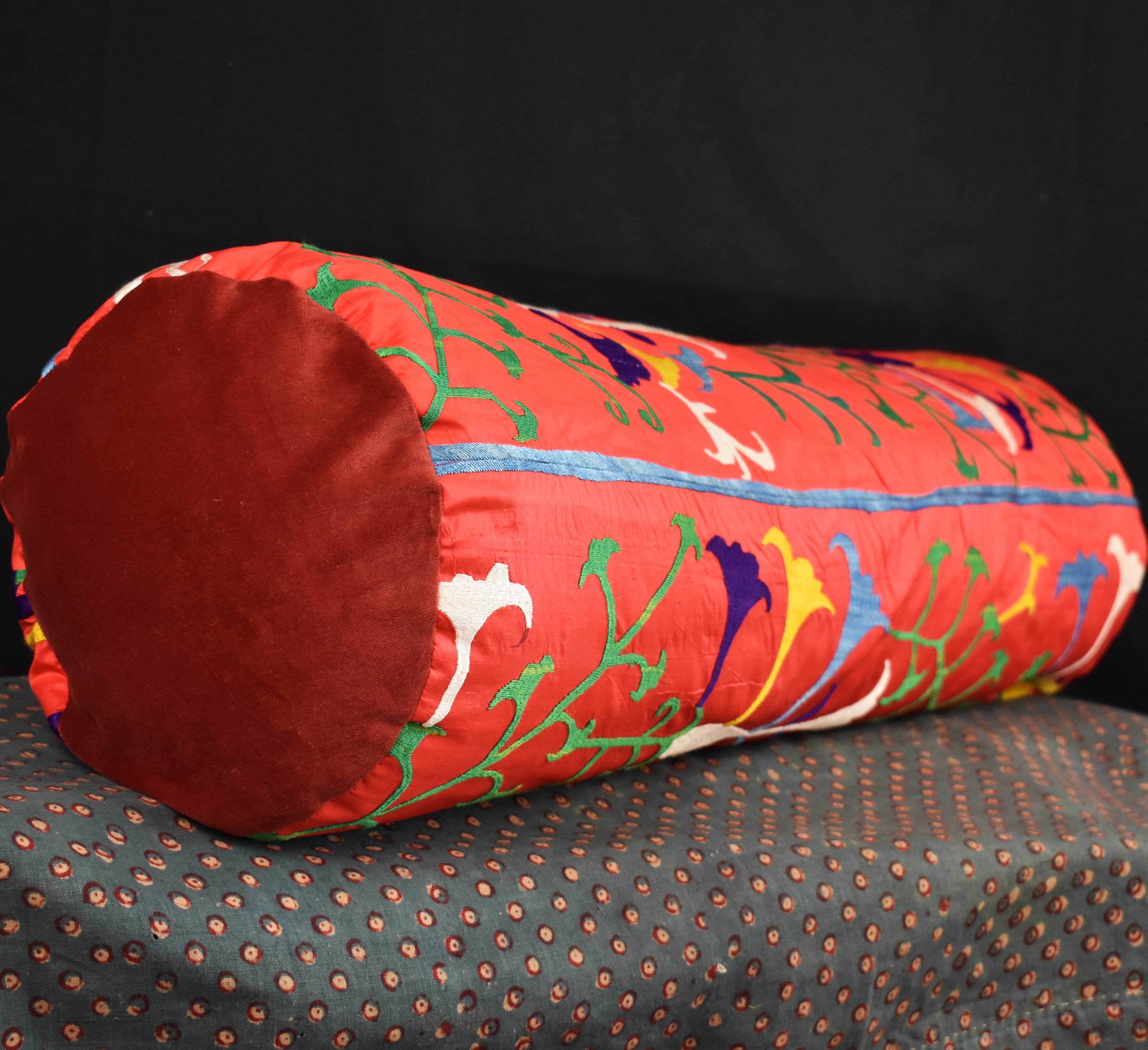 Red silk cushion made in Uzbekistan by the Lakai people, talented artisans
from 19th century embroidered silk.
This cushion closes with a zip and comes with an unfilled liner for easy filling.