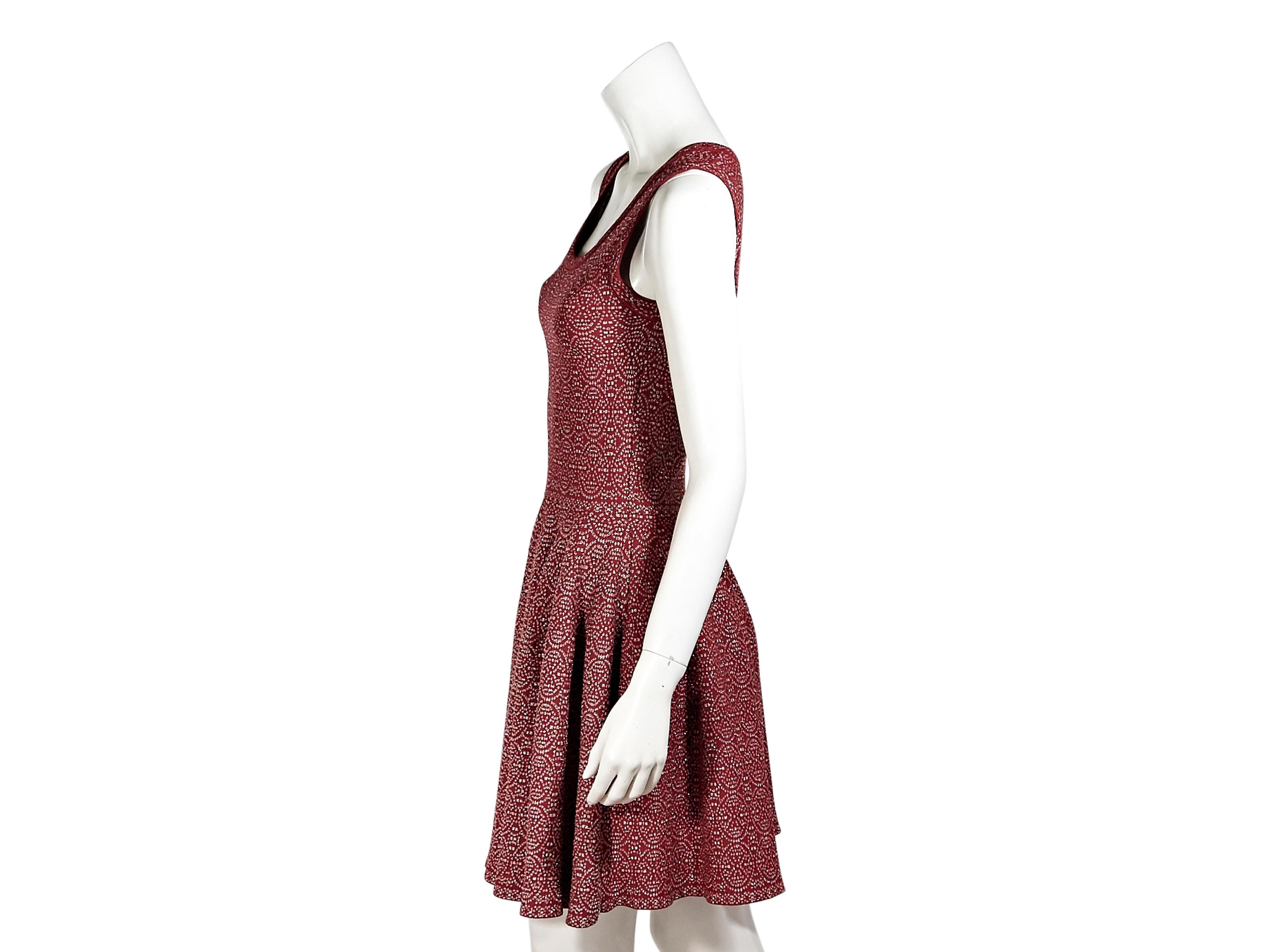 Product details:  Red and silver printed spandex fit-and-flare dress by Alaia.  Scoopneck.  Sleeveless.  Concealed back zip closure.  28