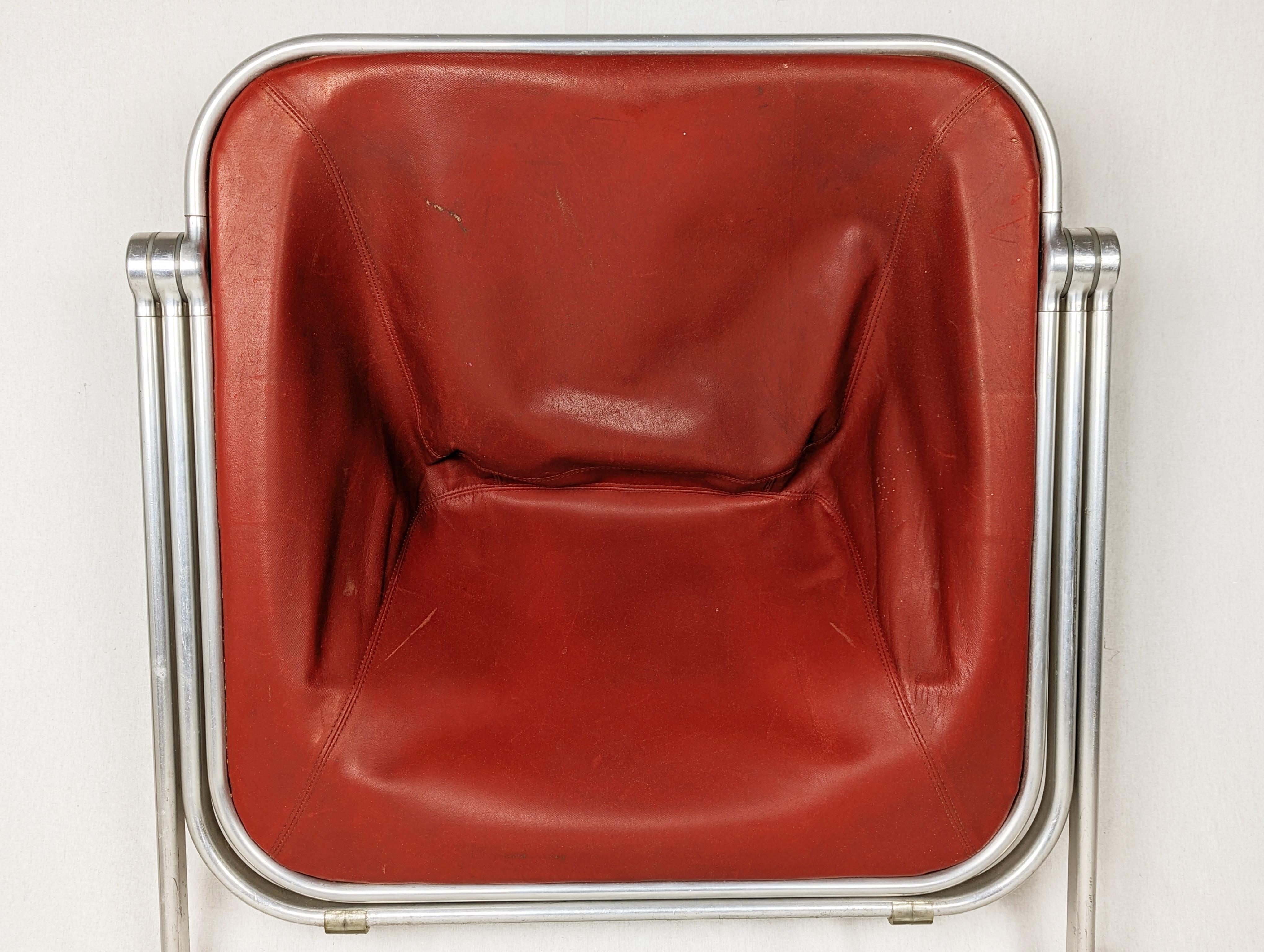Italian red skai & aluminum 1969 folding chair Plona by G. Piretti for Anonima Castelli For Sale