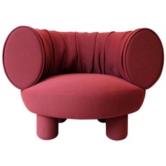 Canapé rouge conçu par Thomas Dariel